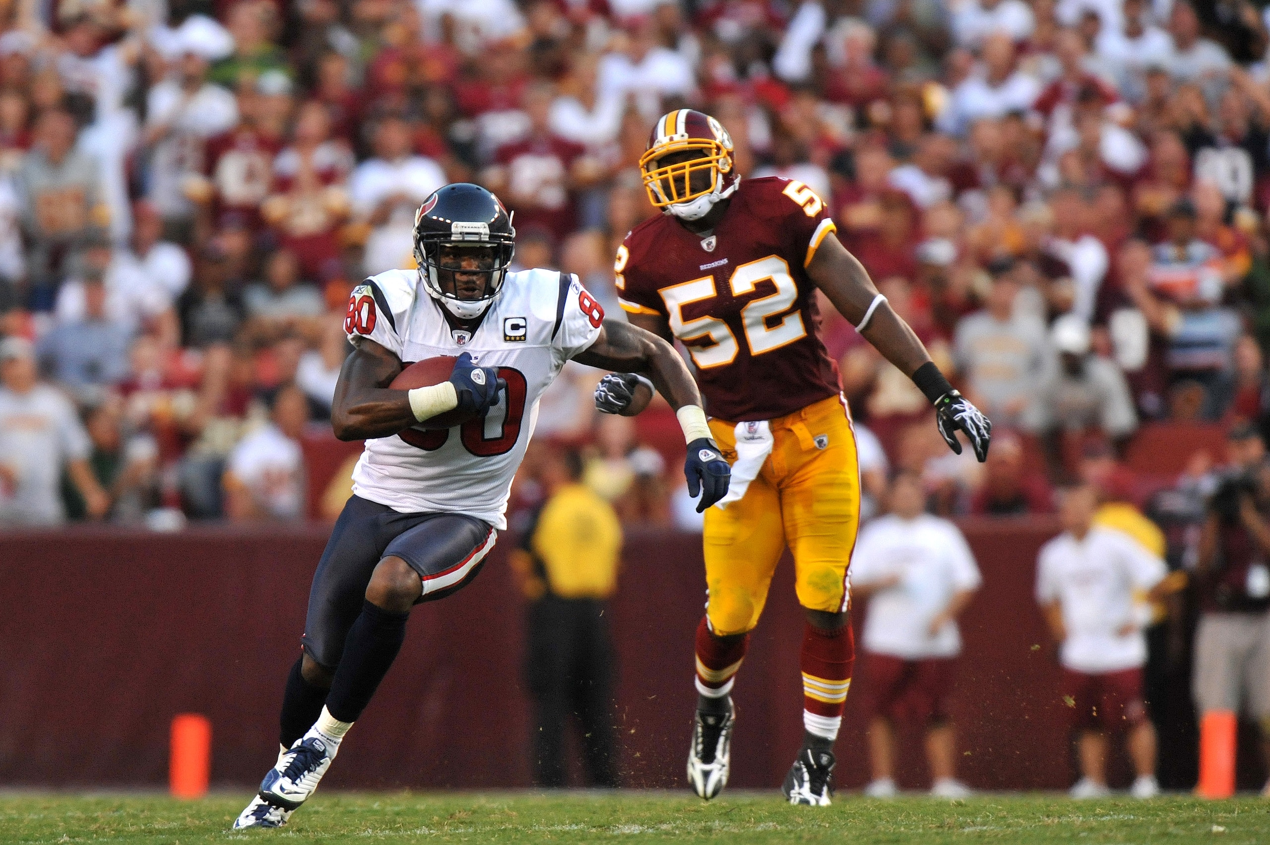 LANDOVER - SEPTEMBER 19:  Andre Johnson #80 of the Houston Texans runs the ball against the Washington Redskins at FedExField on September 19, 2010 in Landover, Maryland. The Texans defeated the Redskins 30-27 in overtime. (Photo by Larry French/Getty Ima