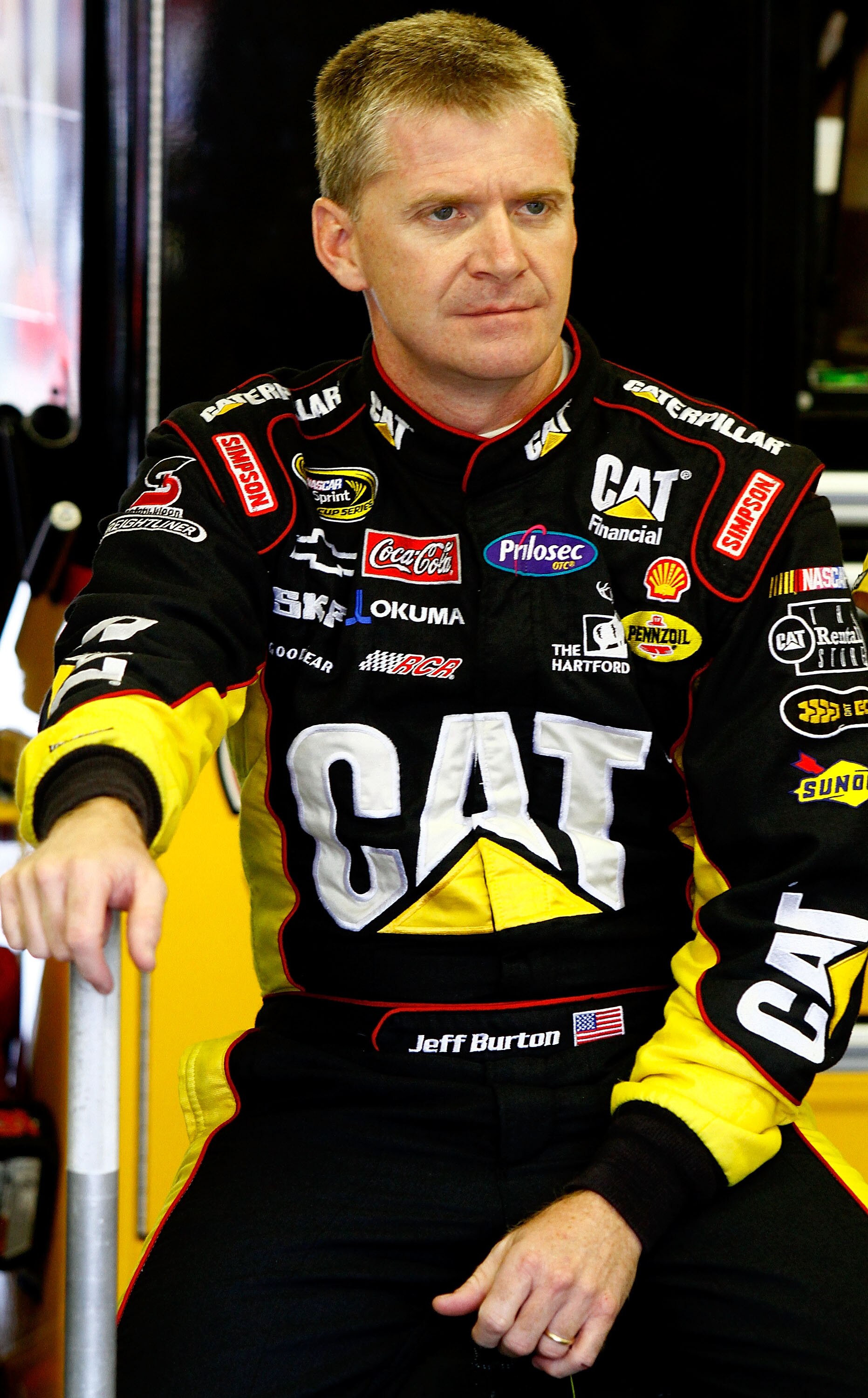 LOUDON, NH - SEPTEMBER 18:  Jeff Burton, driver of the #31 Caterpillar Chevrolet, looks on in the garage during practice for the NASCAR Sprint Cup Series Sylvania 300 at New Hampshire Motor Speedway on September 18, 2010 in Loudon, New Hampshire.  (Photo