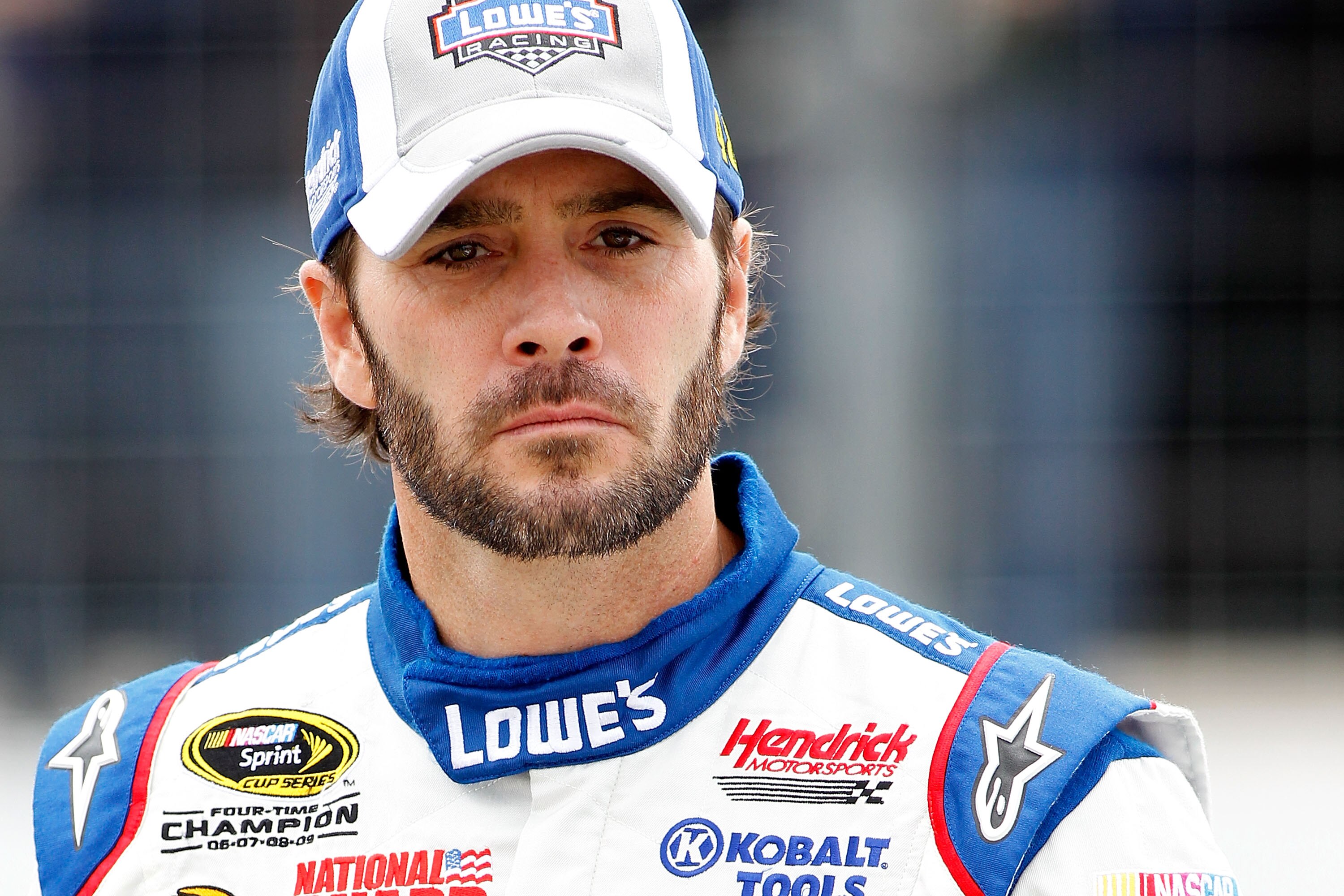 LOUDON, NH - SEPTEMBER 17:  Jimmie Johnson, driver of the #48  Lowe's / Johns Manville, looks on during qualifying for the NASCAR Sprint Cup Series Sylvania 300 at New Hampshire Motor Speedway on September 17, 2010 in Loudon, New Hampshire.  (Photo by Tod