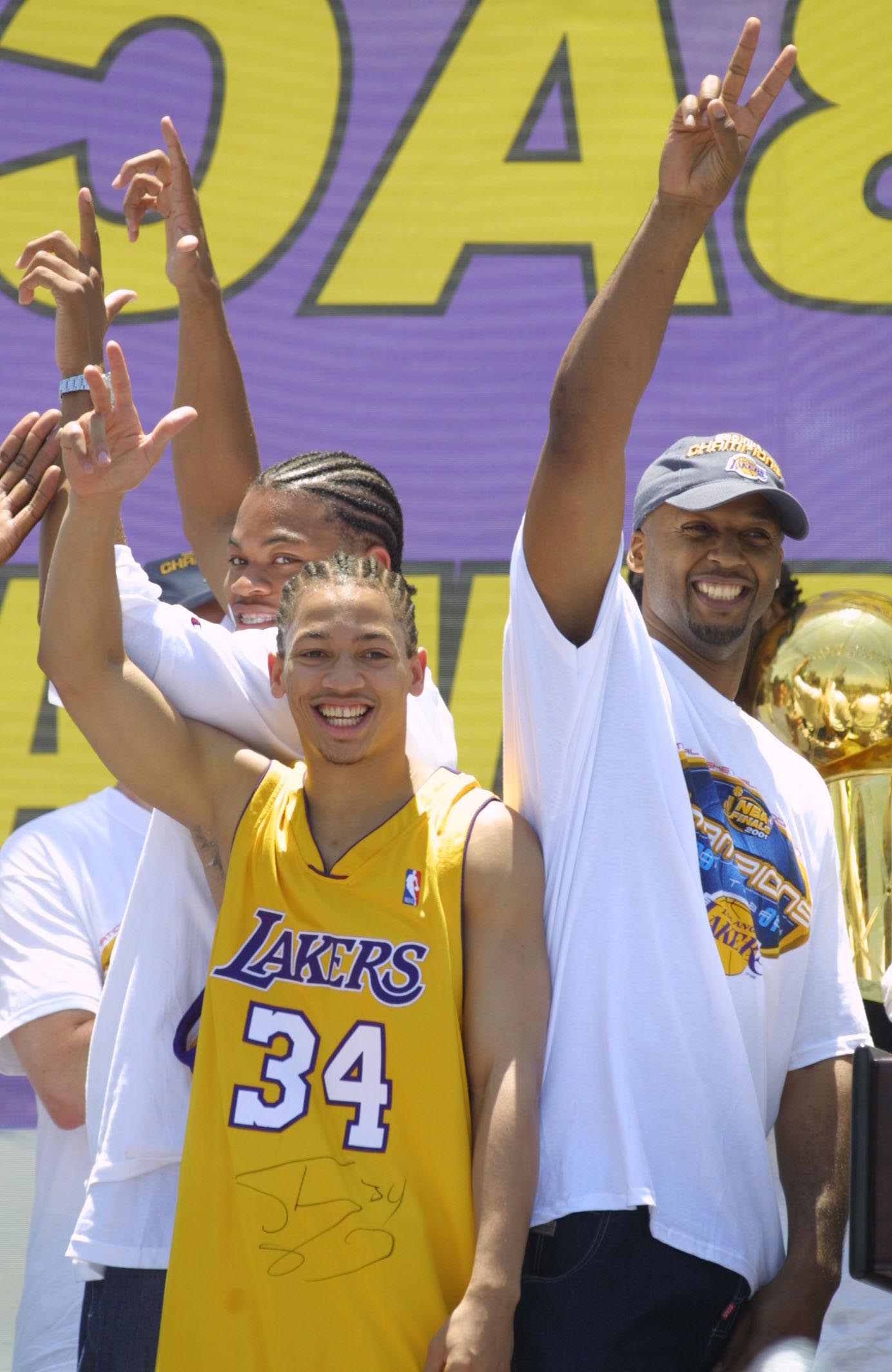 18 Jun 01:  (L-R) Devean George, Tyronn Lue and Brian Shaw hope to win back to back to back championships next year by standing with their backs together during the Lakers parade at Staples Center in Los Angeles, California. DIGITAL IMAGE Mandatory Credit