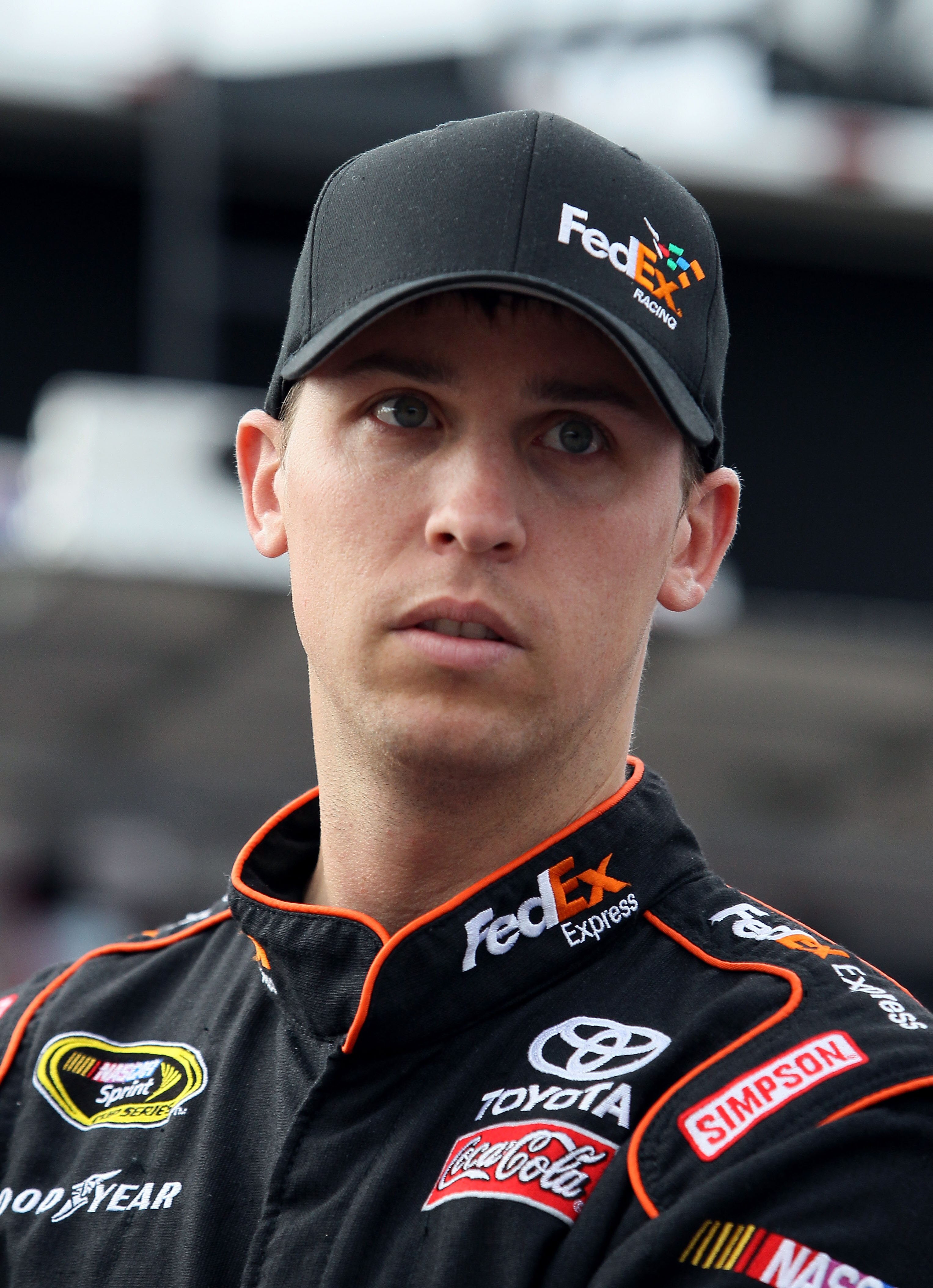 LOUDON, NH - SEPTEMBER 18:  Denny Hamlin, driver of the #11 FedEx Small Business Toyota, looks on during practice for the NASCAR Sprint Cup Series Sylvania 300 at New Hampshire Motor Speedway on September 18, 2010 in Loudon, New Hampshire.  (Photo by Elsa