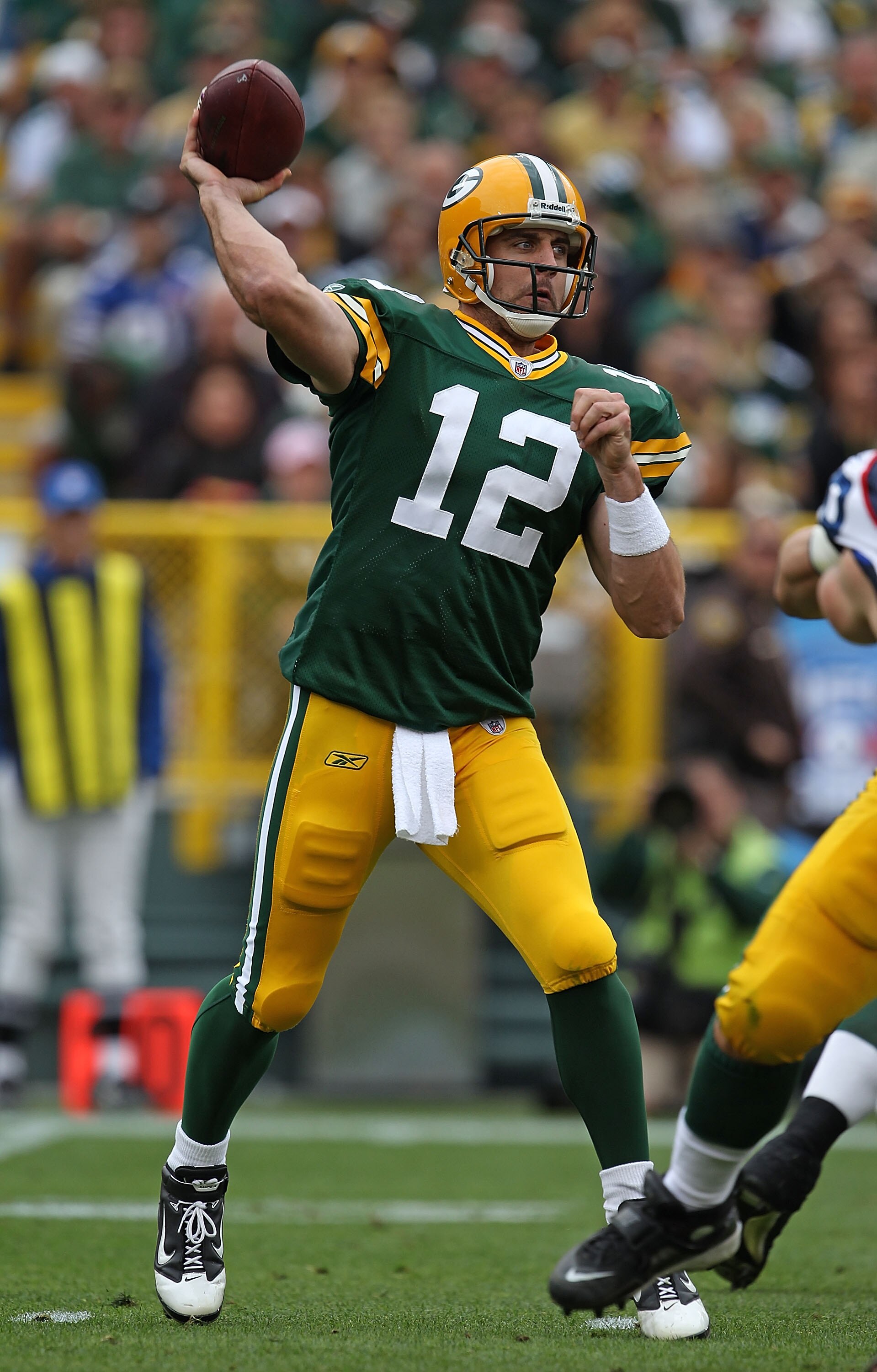 GREEN BAY, WI - SEPTEMBER 19: Aaron Rodgers #12 of the Green Bay Packers throws a pass against the Buffalo Bills at Lambeau Field on September 19, 2010 in Green Bay, Wisconsin. The Packers defeated the Bills 34-7. (Photo by Jonathan Daniel/Getty Images)