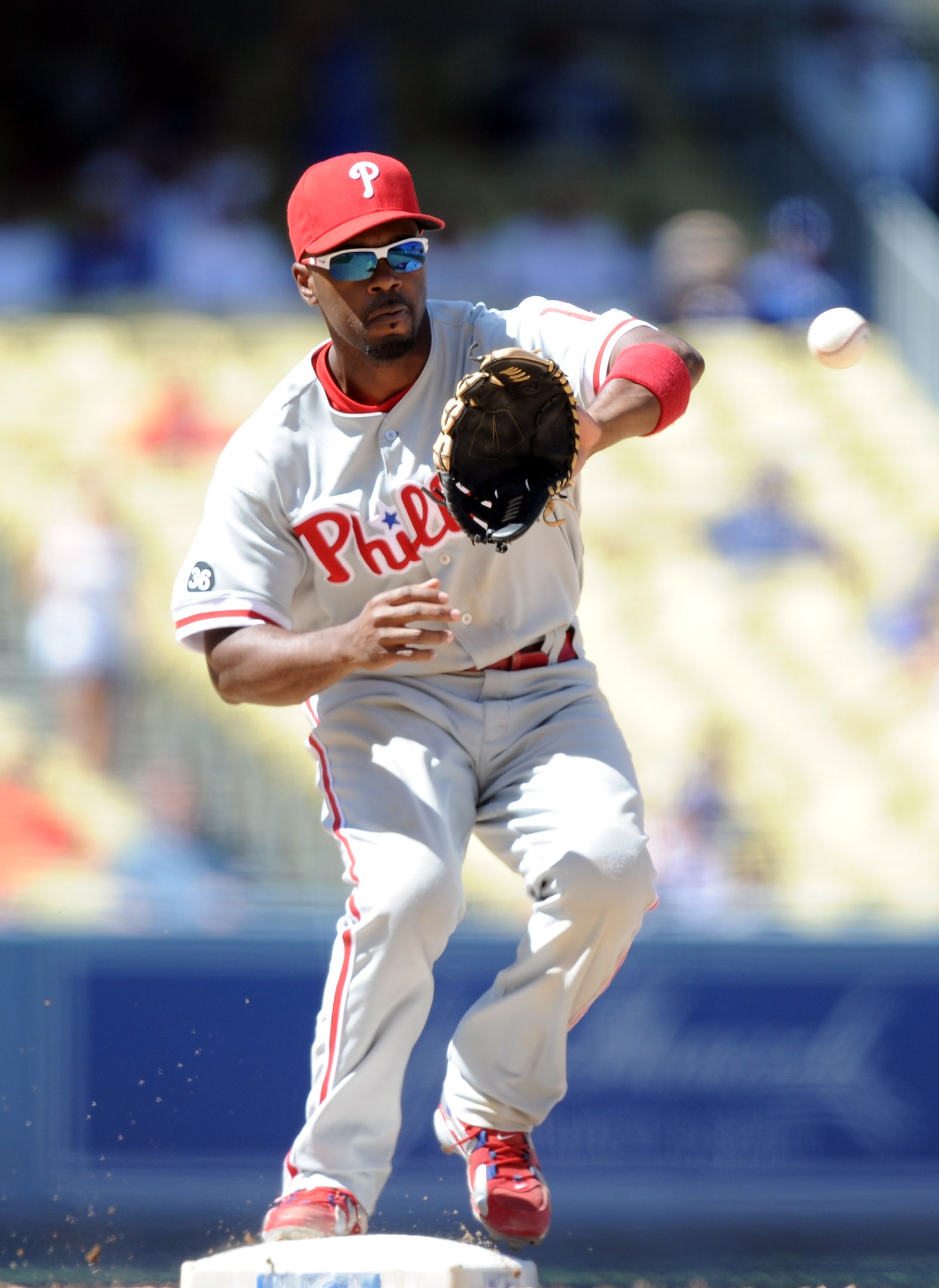 LOS ANGELES, CA - SEPTEMBER 01: Jimmy Rollins #11 of the Philadelphia Phillies catches a throw to second base against the Los Angeles Dodgers at Dodger Stadium on September 1, 2010 in Los Angeles, California. (Photo by Harry How/Getty Images) LOS ANGELES, CA - SEPTEMBER 01: Jimmy Rollins #11 of the Philadelphia Phillies catches a throw to second base against the Los Angeles Dodgers at Dodger Stadium on September 1, 2010 in Los Angeles, California. (Photo by Harry How/Getty Images)