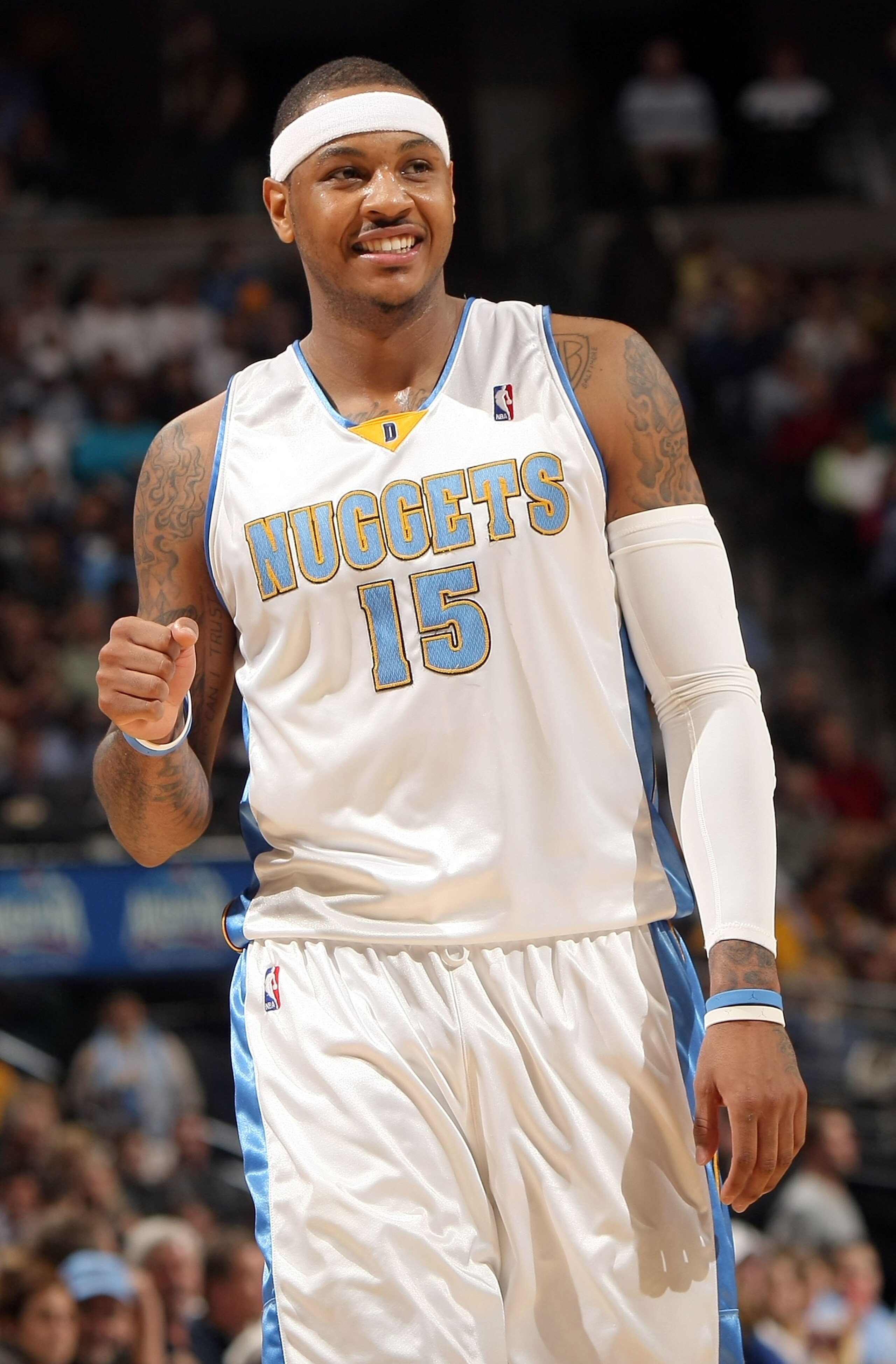 DENVER - JANUARY 13: Carmelo Anthony #15 of the Denver Nuggets reacts after a play against the Orlando Magic during NBA action at Pepsi Center on January 13, 2010 in Denver, Colorado. The Nuggets defeated the Magic 115-97. NOTE TO USER: User expressly ac DENVER - JANUARY 13: Carmelo Anthony #15 of the Denver Nuggets reacts after a play against the Orlando Magic during NBA action at Pepsi Center on January 13, 2010 in Denver, Colorado. The Nuggets defeated the Magic 115-97. NOTE TO USER: User expressly ac