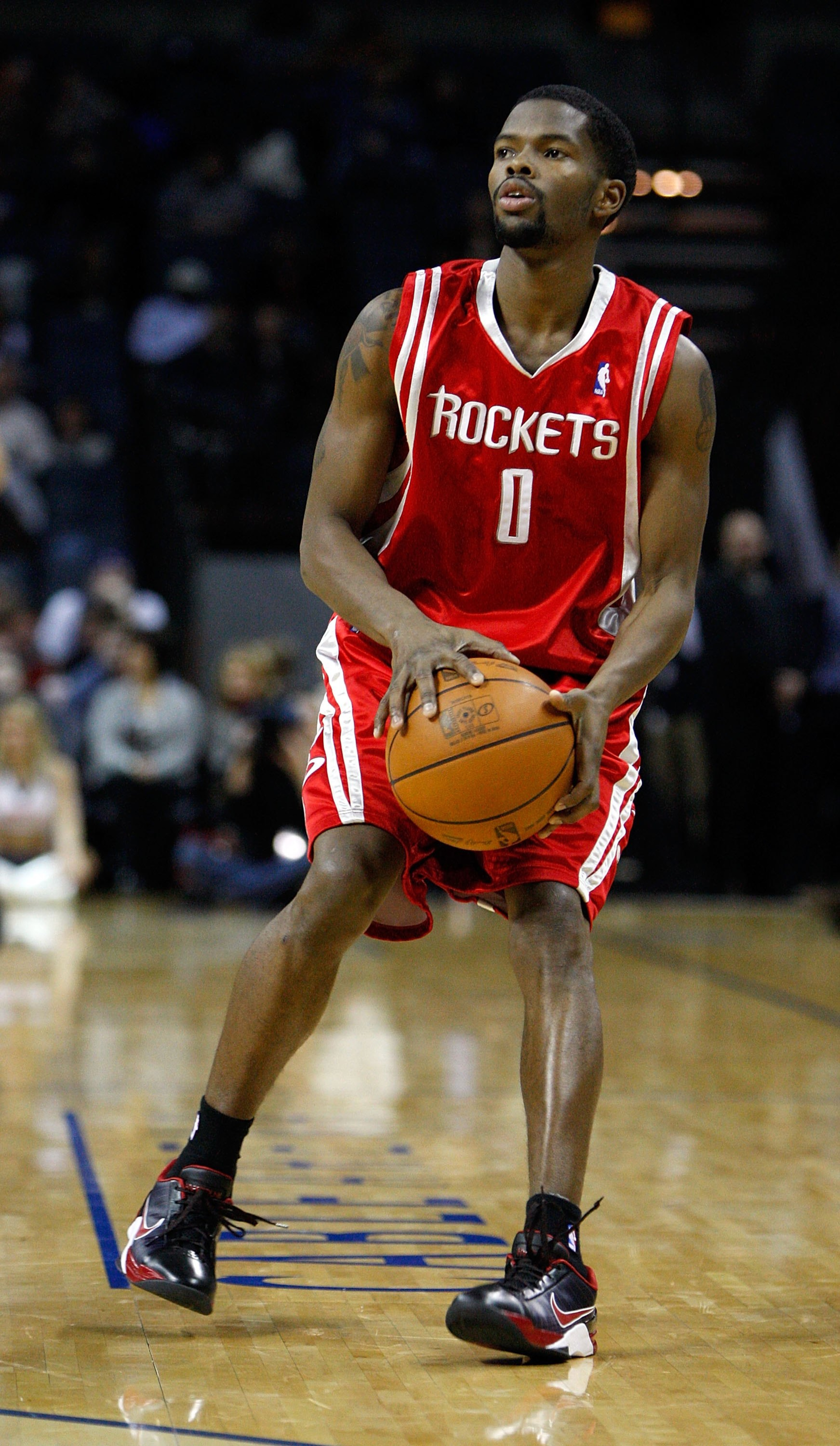 CHARLOTTE, NC - JANUARY 12: Aaron Brooks #0 of the Houston Rockets shoots during the game against the Charlotte Bobcats on January 12, 2010 at Time Warner Cable Arena in Charlotte, North Carolina. The Bobcats won 102-94. NOTE TO USER: User expressly ac CHARLOTTE, NC - JANUARY 12: Aaron Brooks #0 of the Houston Rockets shoots during the game against the Charlotte Bobcats on January 12, 2010 at Time Warner Cable Arena in Charlotte, North Carolina. The Bobcats won 102-94. NOTE TO USER: User expressly ac