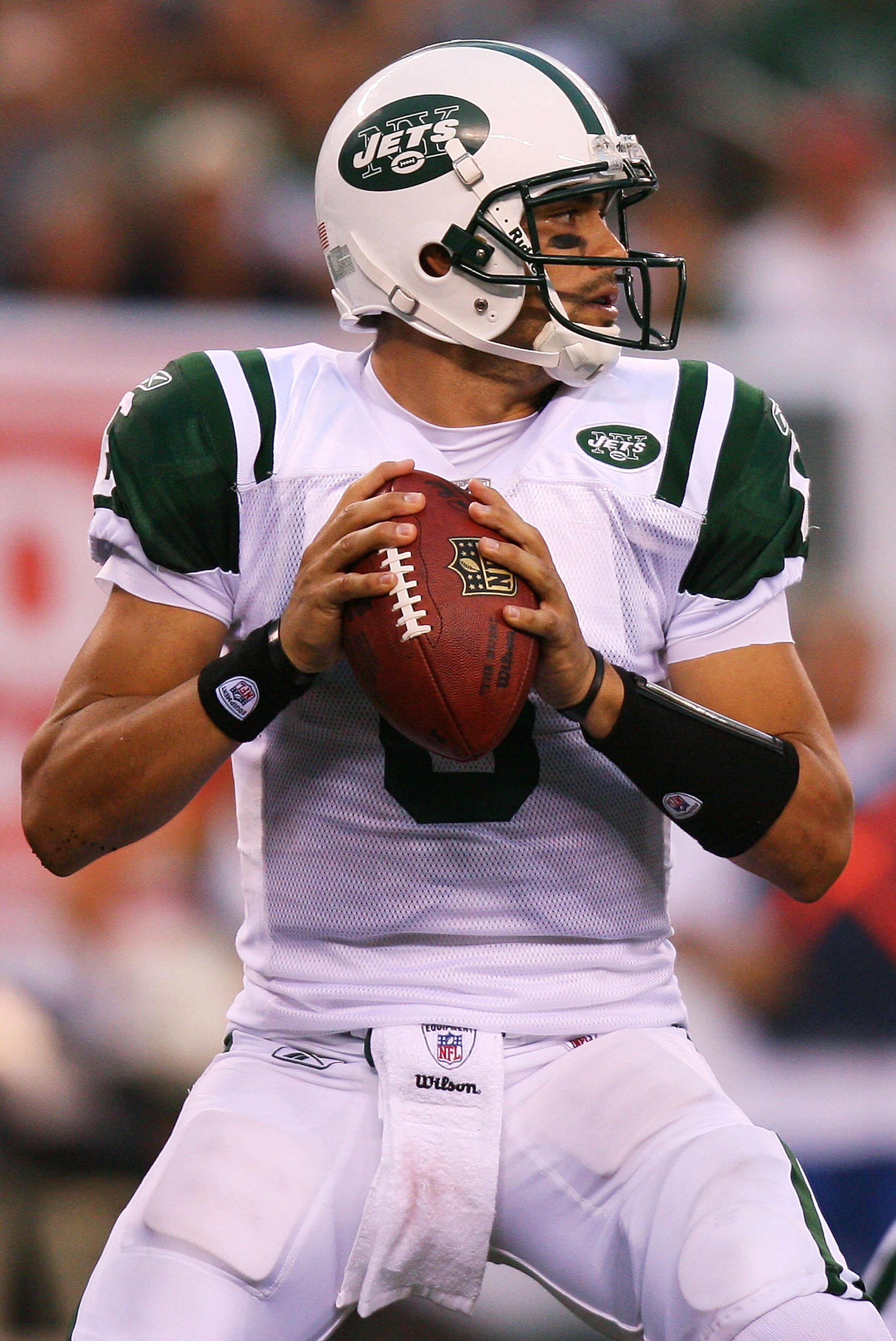 EAST RUTHERFORD, NJ - SEPTEMBER 19:  Mark Sanchez #6 of the New York Jets drops back against the New England Patriots at the New Meadowlands Stadium on September 19, 2010 in East Rutherford, New Jersey. The Jets defeated the Patriots 28 - 14.  (Photo by A