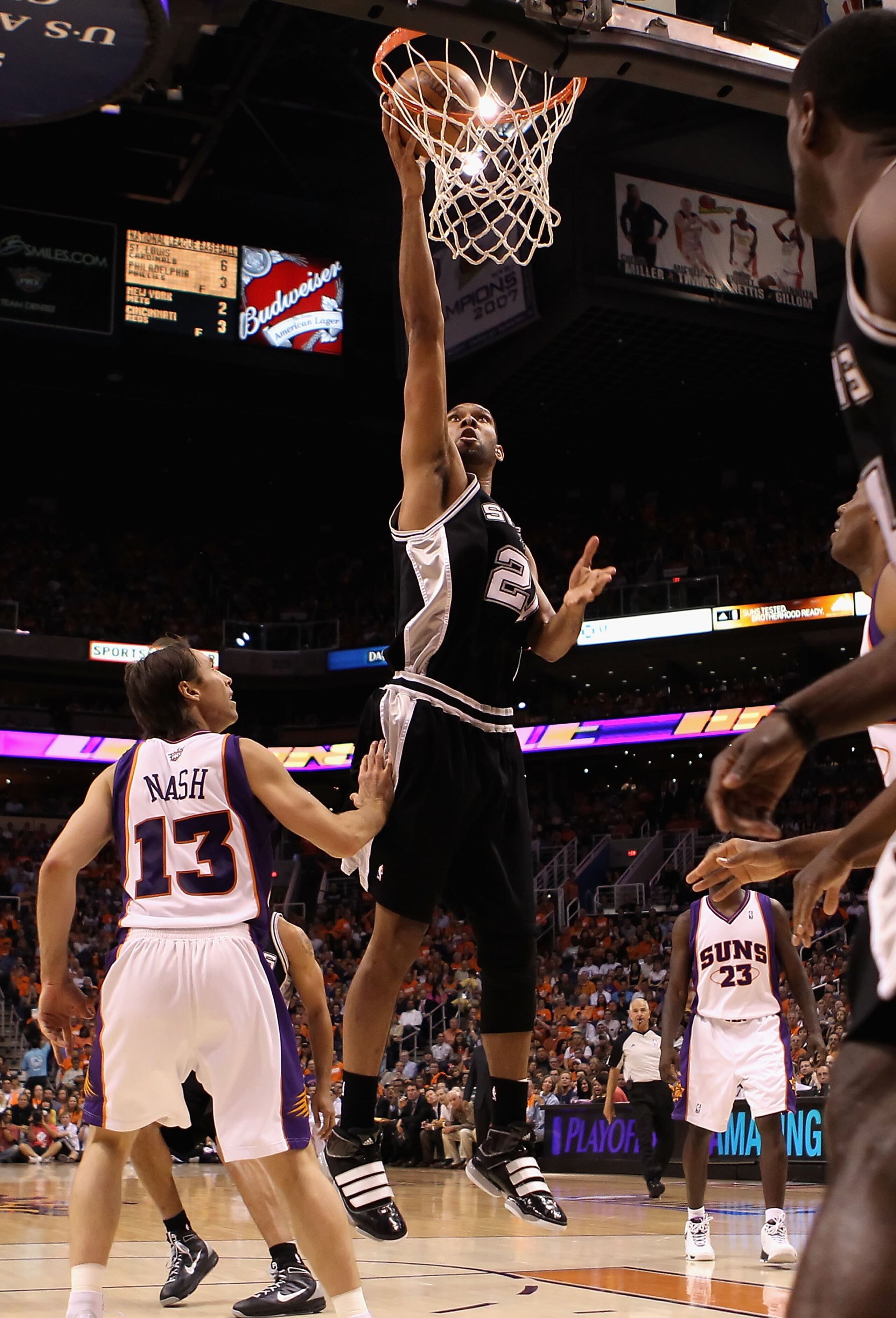 PHOENIX - MAY 03: Tim Duncan #21 of the San Antonio Spurs puts up a shot against the Phoenix Suns during Game One of the Western Conference Semifinals of the 2010 NBA Playoffs at US Airways Center on May 3, 2010 in Phoenix, Arizona. The Suns defeated the PHOENIX - MAY 03: Tim Duncan #21 of the San Antonio Spurs puts up a shot against the Phoenix Suns during Game One of the Western Conference Semifinals of the 2010 NBA Playoffs at US Airways Center on May 3, 2010 in Phoenix, Arizona. The Suns defeated the