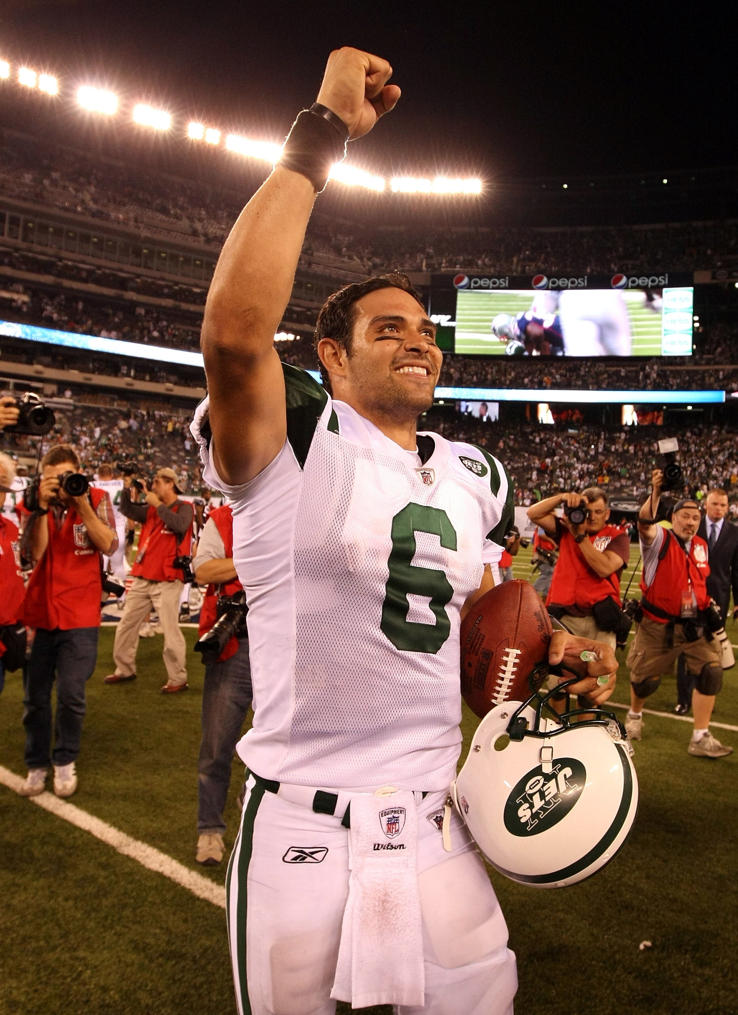 EAST RUTHERFORD, NJ - SEPTEMBER 19:  Mark Sanchez #6 of the New York Jets celebrates a 28-14 win against the New England Patriots on September 19, 2010 at the New Meadowlands Stadium  in East Rutherford, New Jersey.  (Photo by Al Bello/Getty Images)