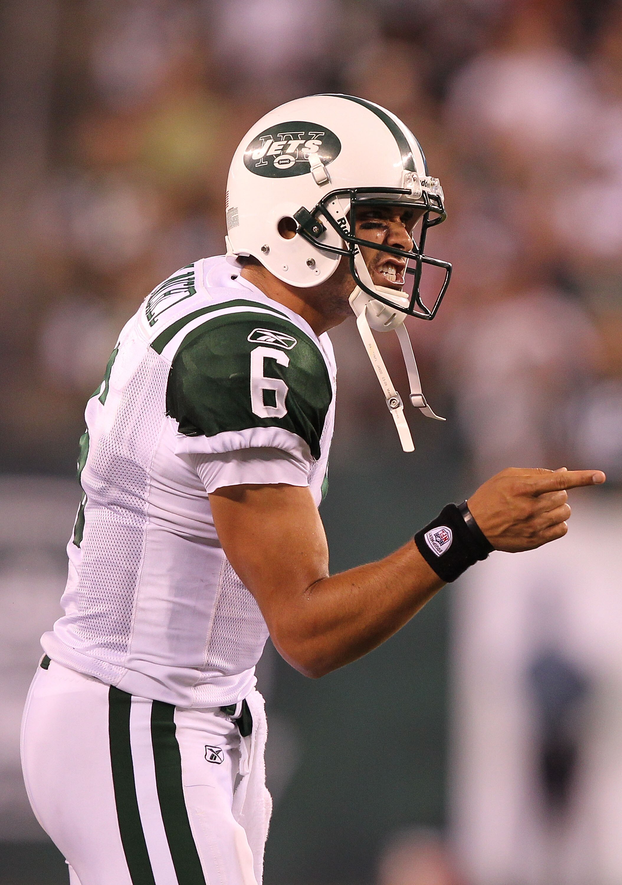 EAST RUTHERFORD, NJ - SEPTEMBER 19:  Mark Sanchez #6 of the New York Jets celebrates a touchdown against the New England Patriots during their  game on September 19, 2010 at the New Meadowlands Stadium  in East Rutherford, New Jersey.  (Photo by Al Bello/