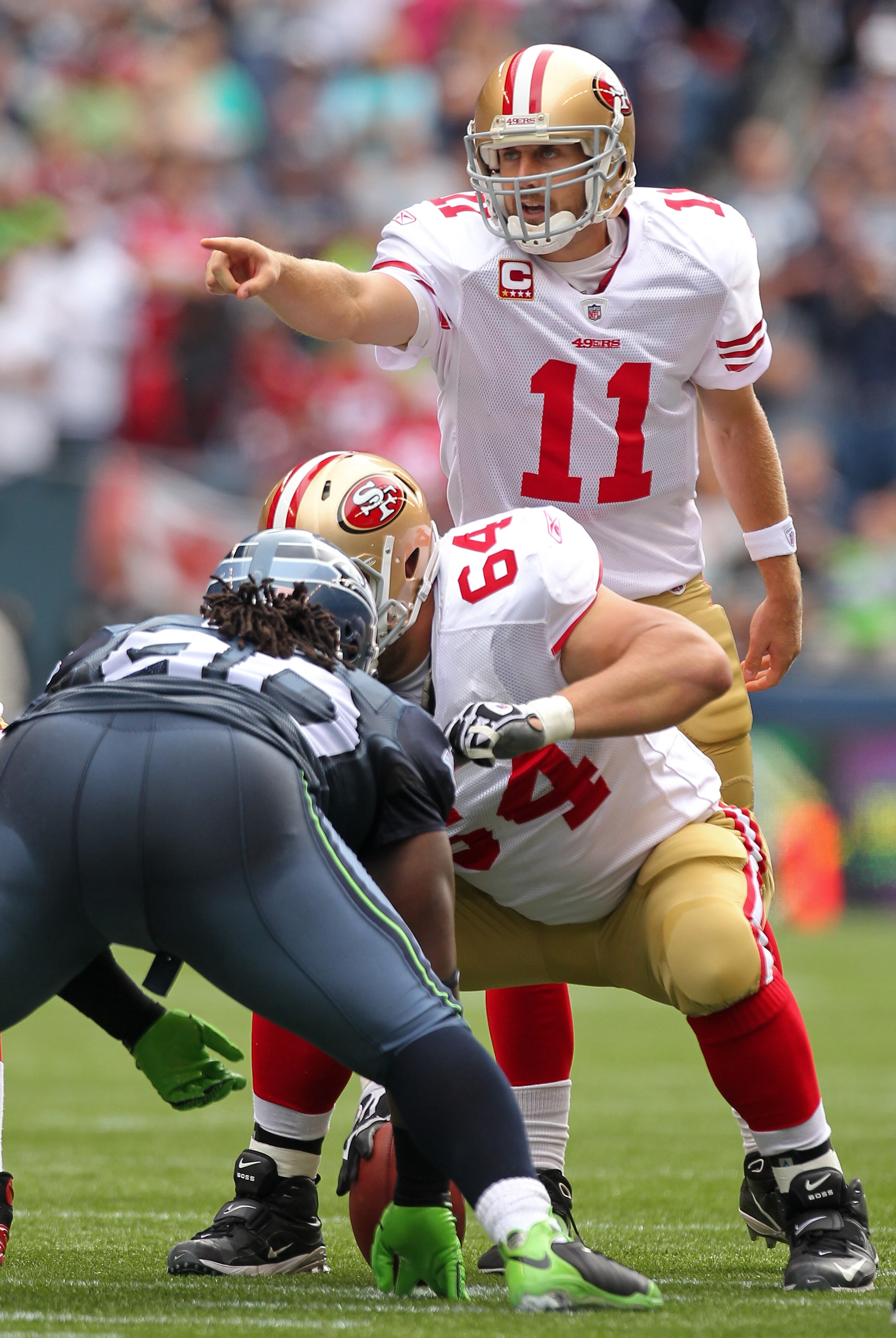SEATTLE - SEPTEMBER 12:  Quarterback Alex Smith #11 of the San Francisco 49ers gestures during the NFL season opener against the Seattle Seahawks at Qwest Field on September 12, 2010 in Seattle, Washington. (Photo by Otto Greule Jr/Getty Images)