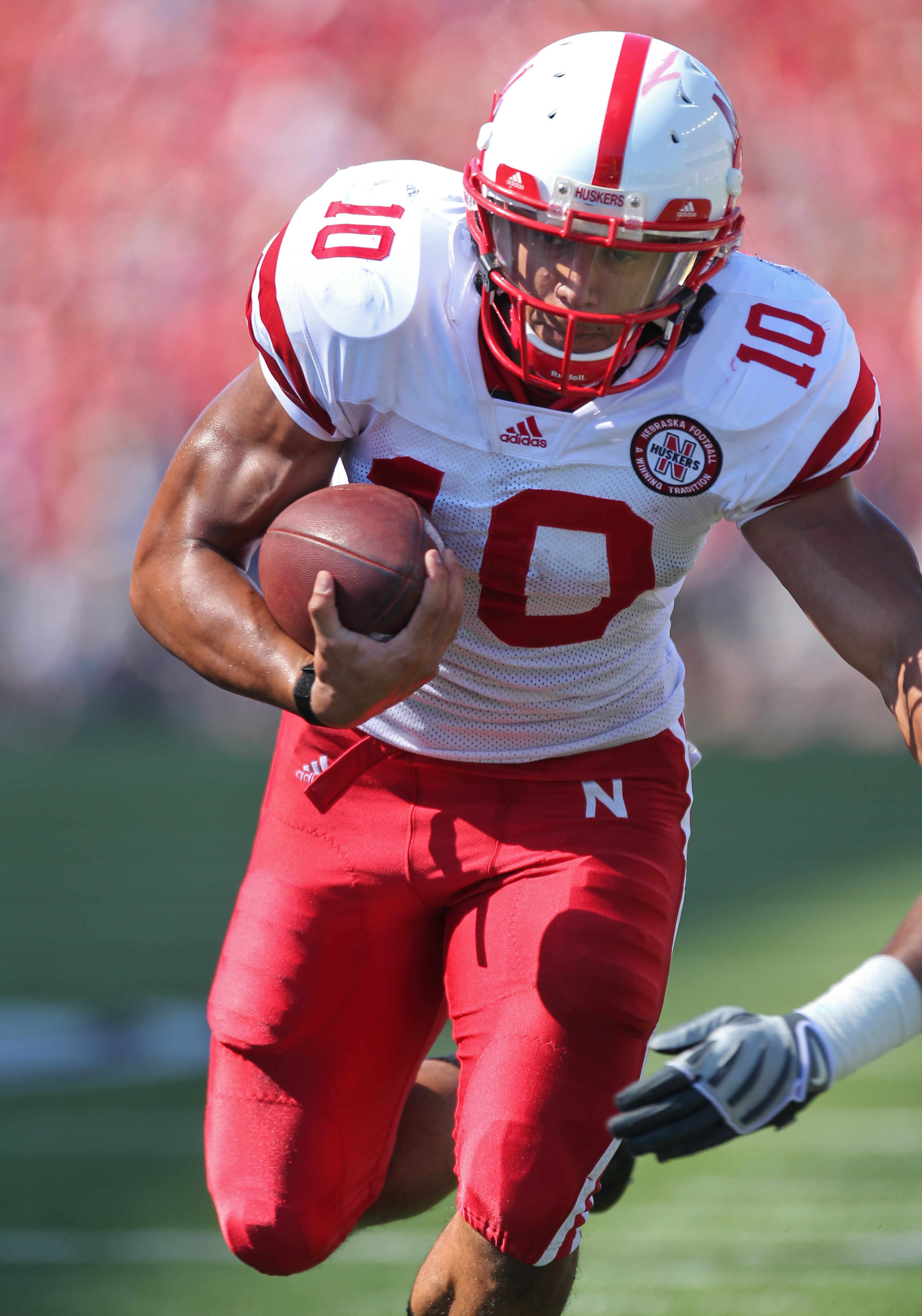 SEATTLE - SEPTEMBER 18: Running back Roy Helu Jr. #10 of the Nebraska Cornhuskers rushes for a touchdown in the second quarter against the Washington Huskies on September 18, 2010 at Husky Stadium in Seattle, Washington. (Photo by Otto Greule Jr/Getty Ima