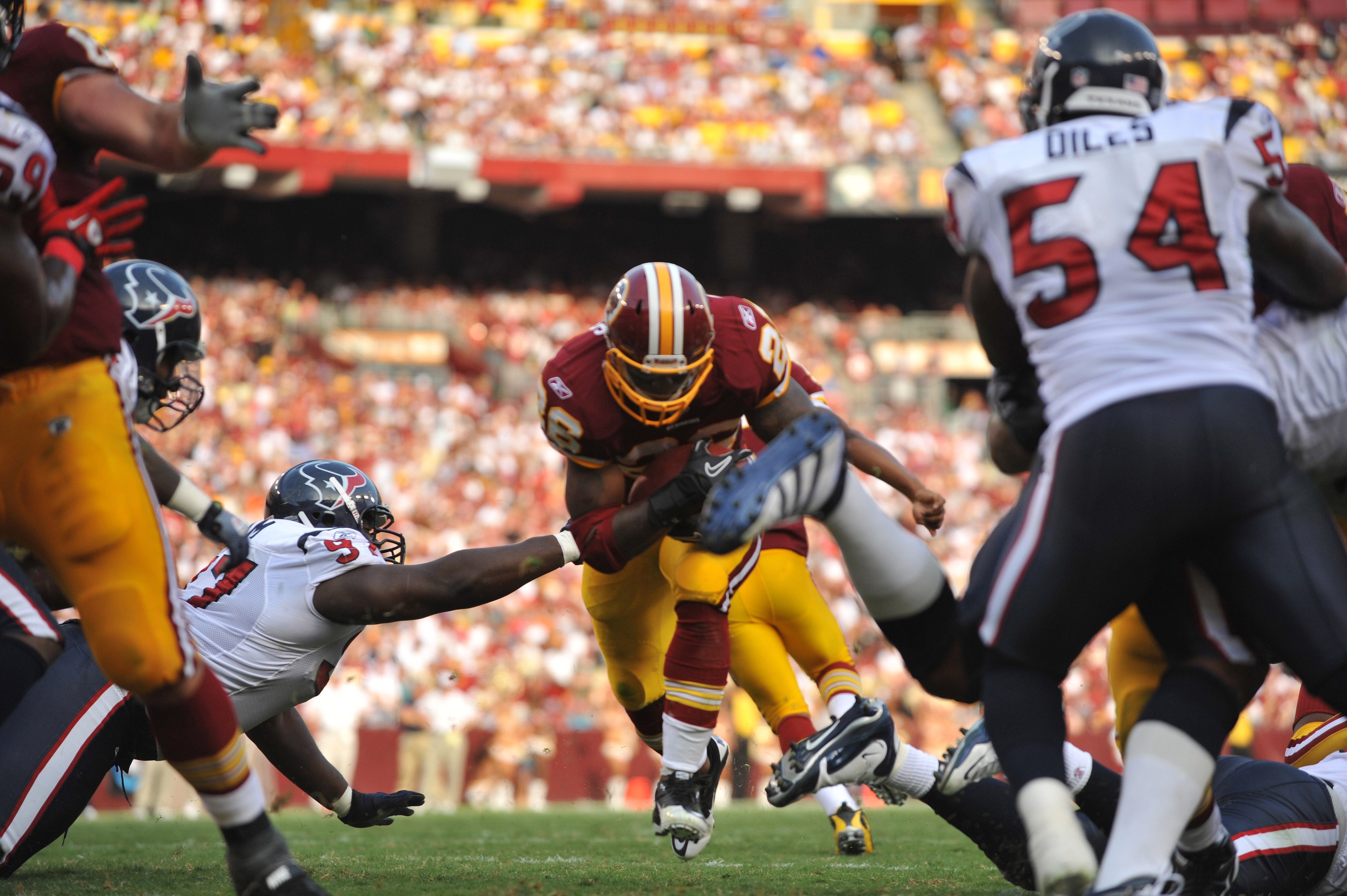 LANDOVER, MD - SEPTEMBER 19: Clinton Portis #26 of the Washington Redskins scores a touchdown against the Houston Texans at FedExField on September 19, 2010 in Landover, Maryland. The Redskins lead the Texans at the half 20-7. (Photo by Larry French/Gett LANDOVER, MD - SEPTEMBER 19: Clinton Portis #26 of the Washington Redskins scores a touchdown against the Houston Texans at FedExField on September 19, 2010 in Landover, Maryland. The Redskins lead the Texans at the half 20-7. (Photo by Larry French/Gett