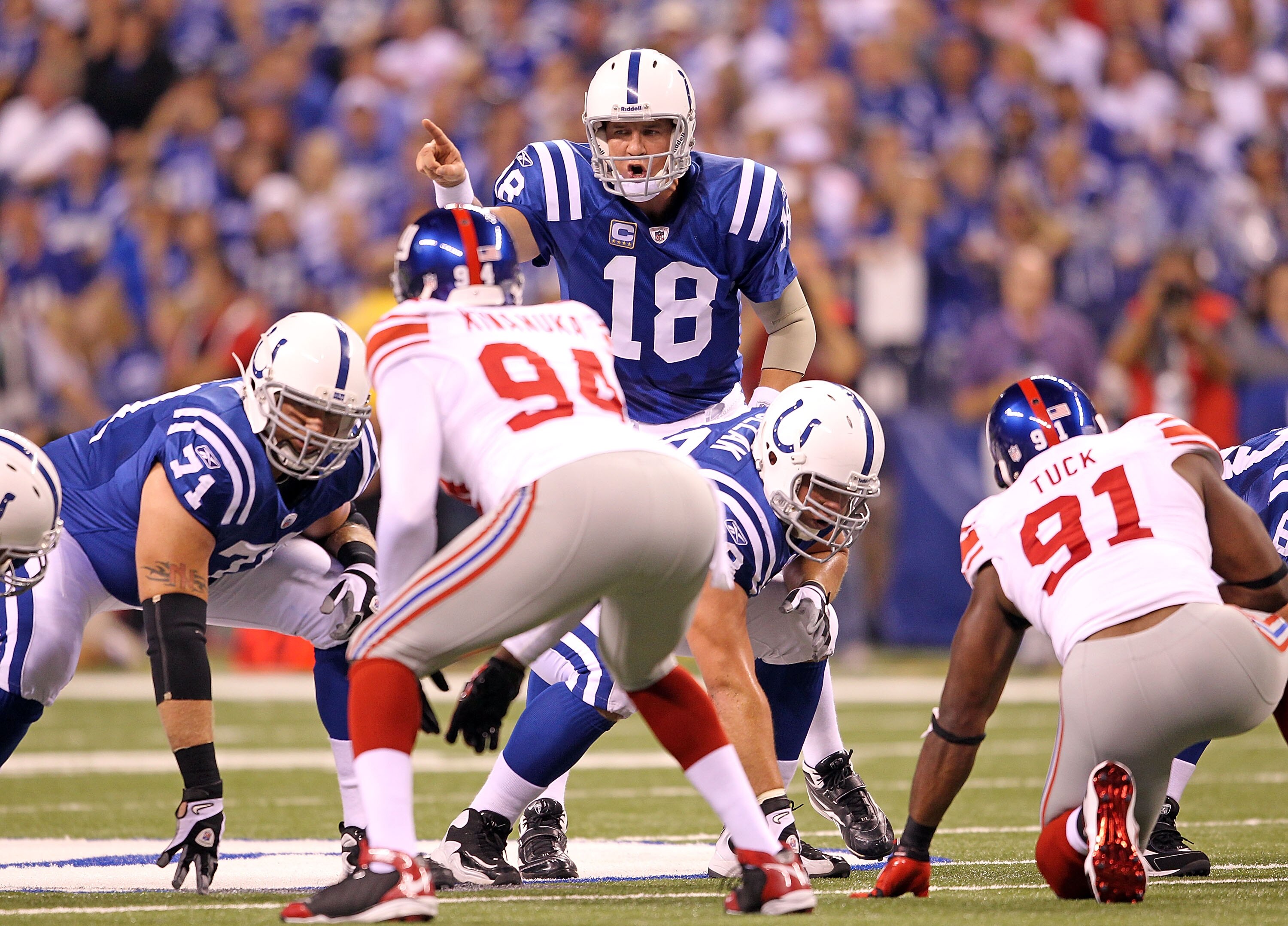 INDIANAPOLIS - SEPTEMBER 19:  Peyton Manning #18 of the Indianapolis Colts gives instructions to his team during  the NFL game against the New York Giants  at Lucas Oil Stadium on September 19, 2010 in Indianapolis, Indiana.  (Photo by Andy Lyons/Getty Im