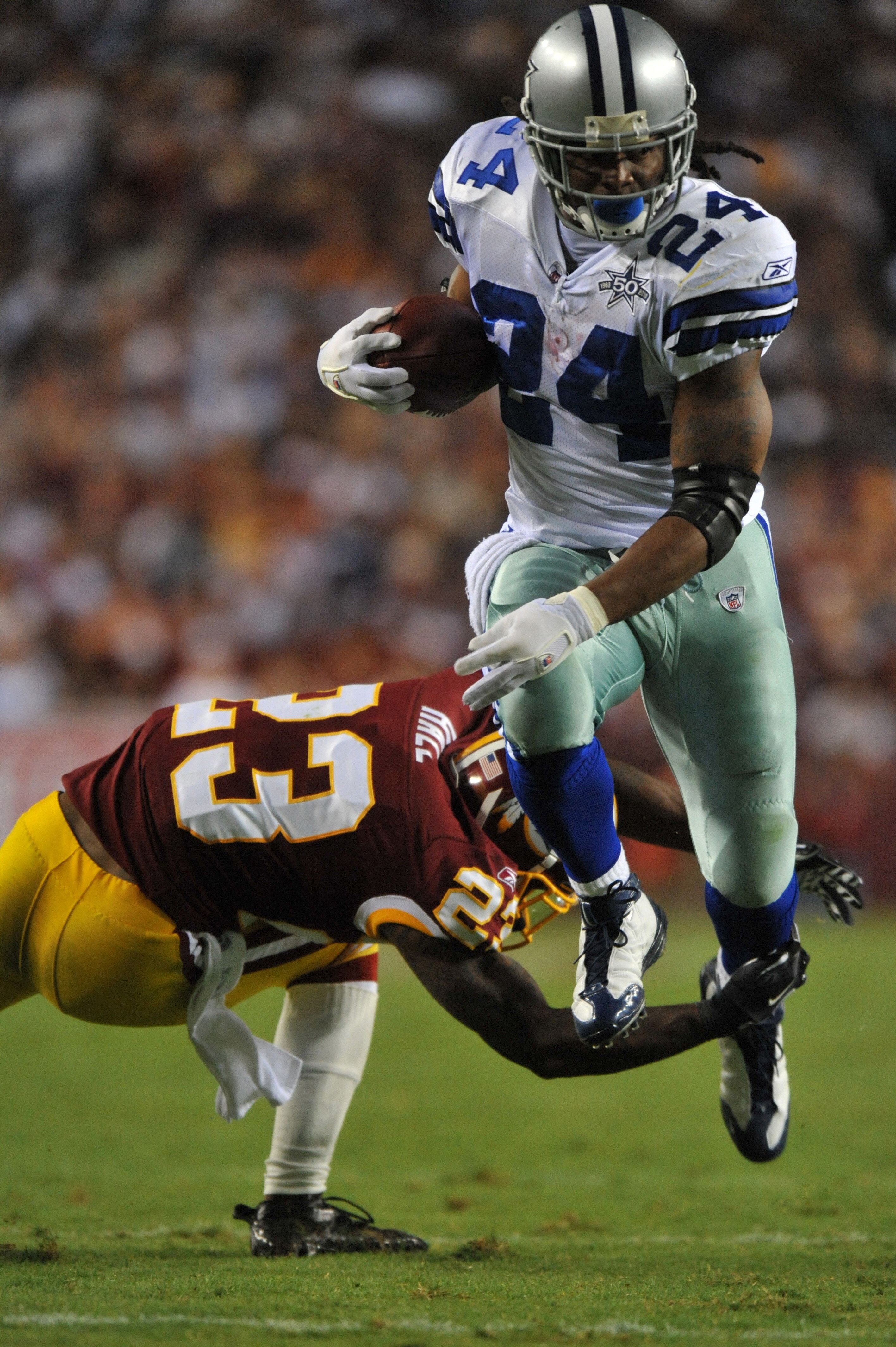 LANDOVER - SEPTEMBER 12:  Marion Barber #24 of the Dallas Cowboys runs the ball during the NFL season opener against the Washington Redskins at FedExField on September 12, 2010 in Landover, Maryland. The Redskins defeated the Cowboys 13-7. (Photo by Larry
