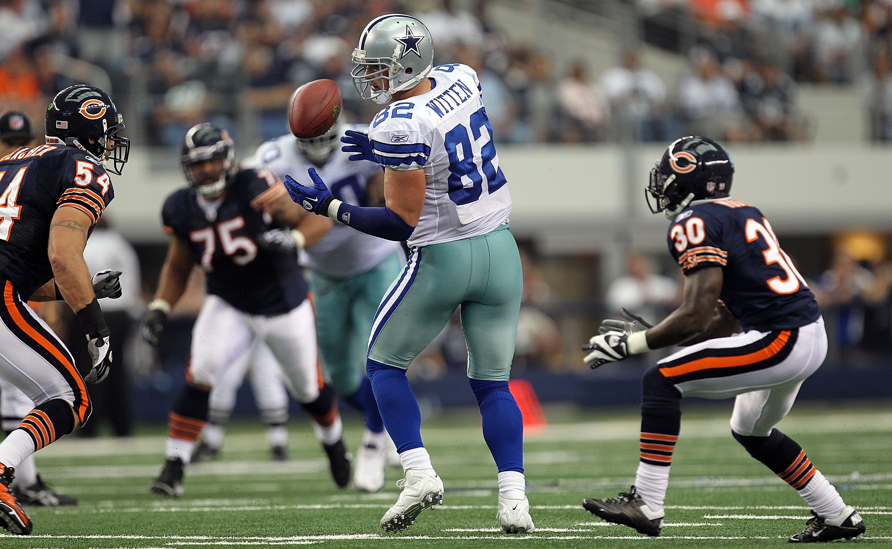 ARLINGTON, TX - SEPTEMBER 19:  Tight end Jason Witten #82 of the Dallas Cowboys drops a pass that was intercepted by D.J. Moore #30 of the Chicago Bears in the second quarter at Cowboys Stadium on September 19, 2010 in Arlington, Texas.  (Photo by Ronald