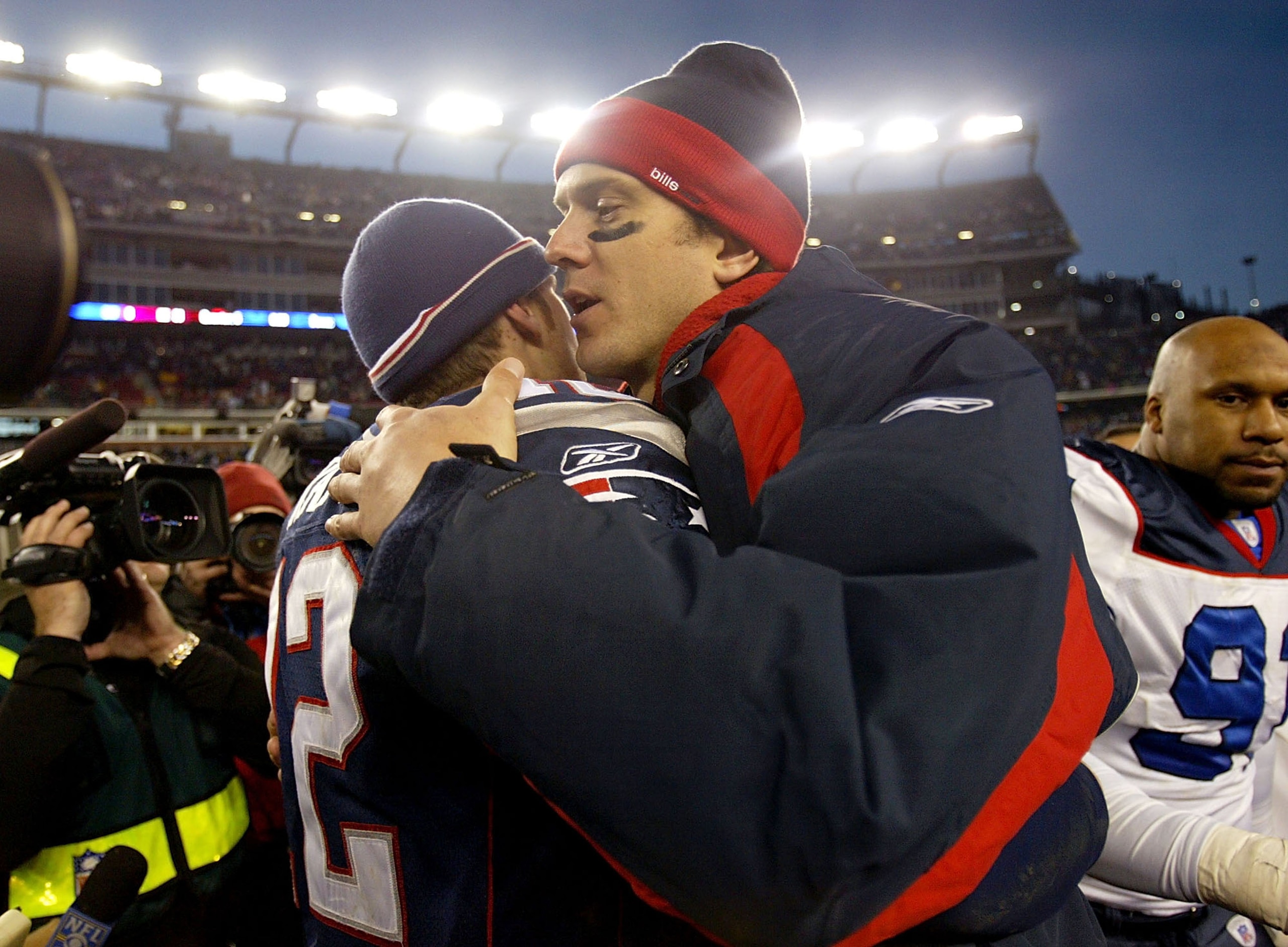 FOXBORO, MA - DECEMBER 27: Drew Bledsoe #11 of the Buffalo Bills congratulates Tom Brady #12 of the New England Patriots after they beat the Buffalo Bills 31-0 on December 27, 2003 at Gillette Stadium in Foxboro, Massachusetts in Landover, Maryland. (Pho FOXBORO, MA - DECEMBER 27: Drew Bledsoe #11 of the Buffalo Bills congratulates Tom Brady #12 of the New England Patriots after they beat the Buffalo Bills 31-0 on December 27, 2003 at Gillette Stadium in Foxboro, Massachusetts in Landover, Maryland. (Pho