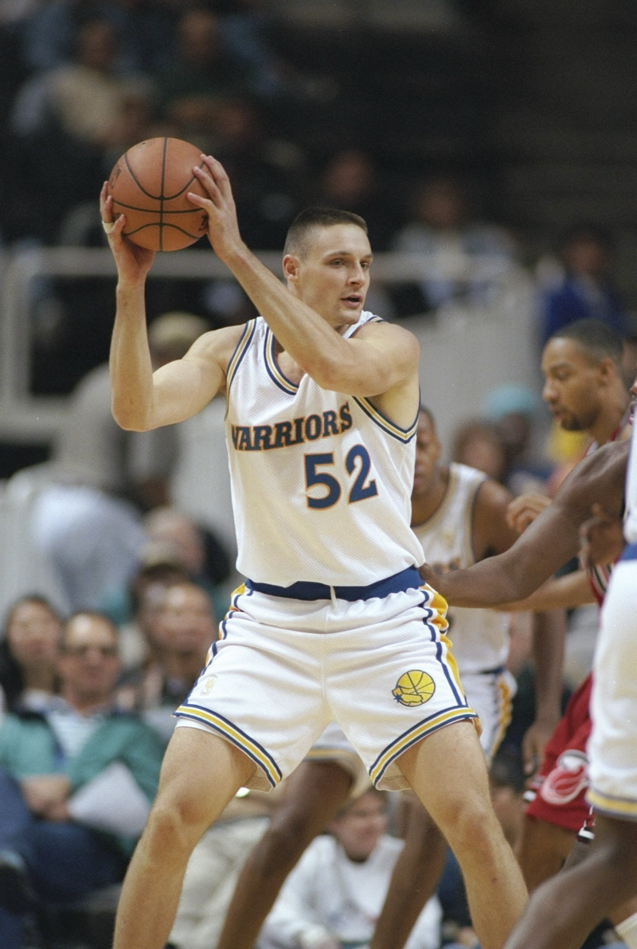26 Nov 1996:  Center Todd Fuller of the Golden State Warriors holds the ball during a game against the Miami Heat at the San Jose Arena in San Jose, California.  The Heat won the game 107-88. Mandatory Credit: Otto Greule  /Allsport