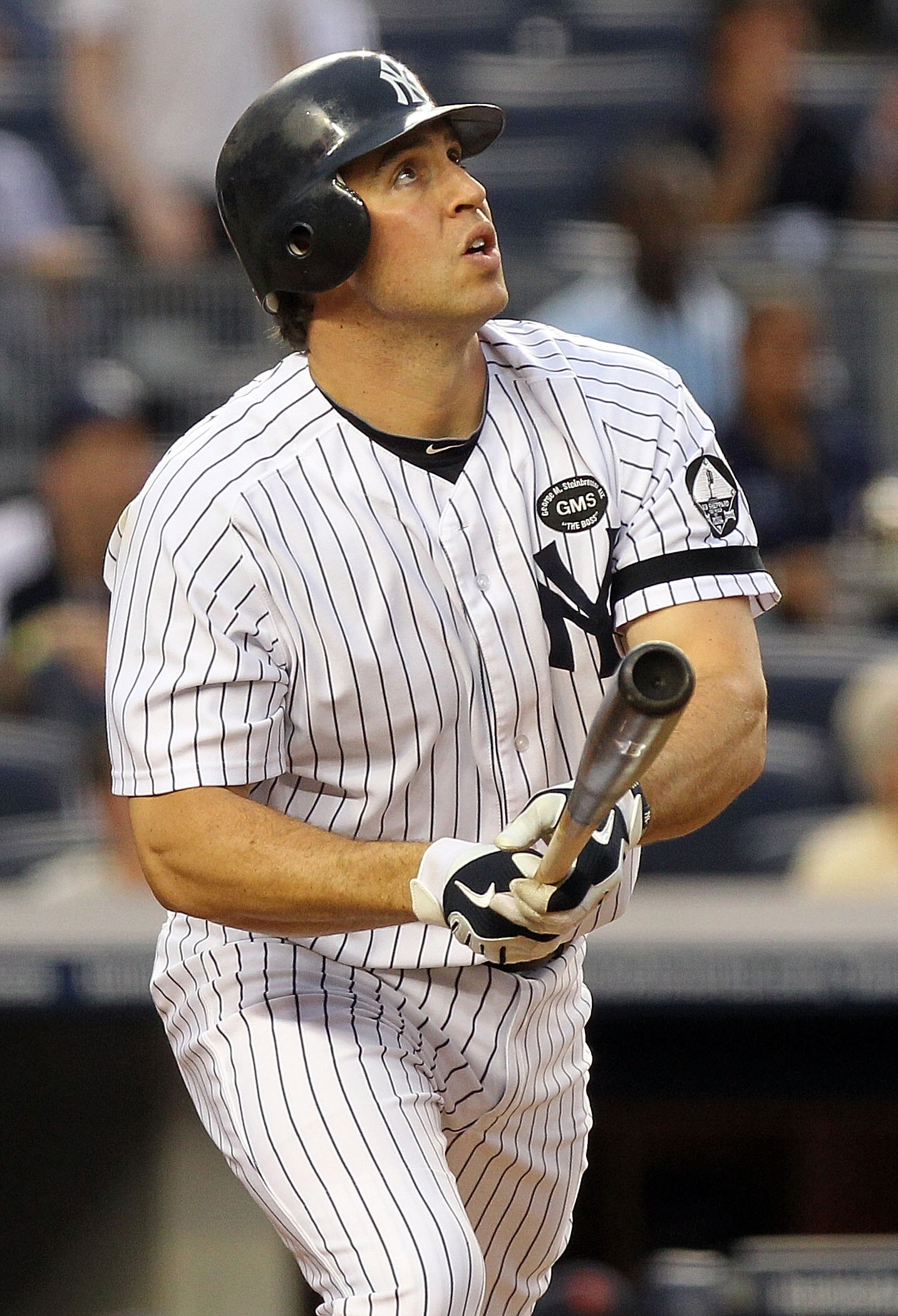 NEW YORK - AUGUST 18:  Mark Teixeira #25 of the New York Yankees hits a first inning two run home run against the Detroit Tigers at Yankee Stadium on August 18, 2010 in the Bronx borough of New York City.  (Photo by Nick Laham/Getty Images)