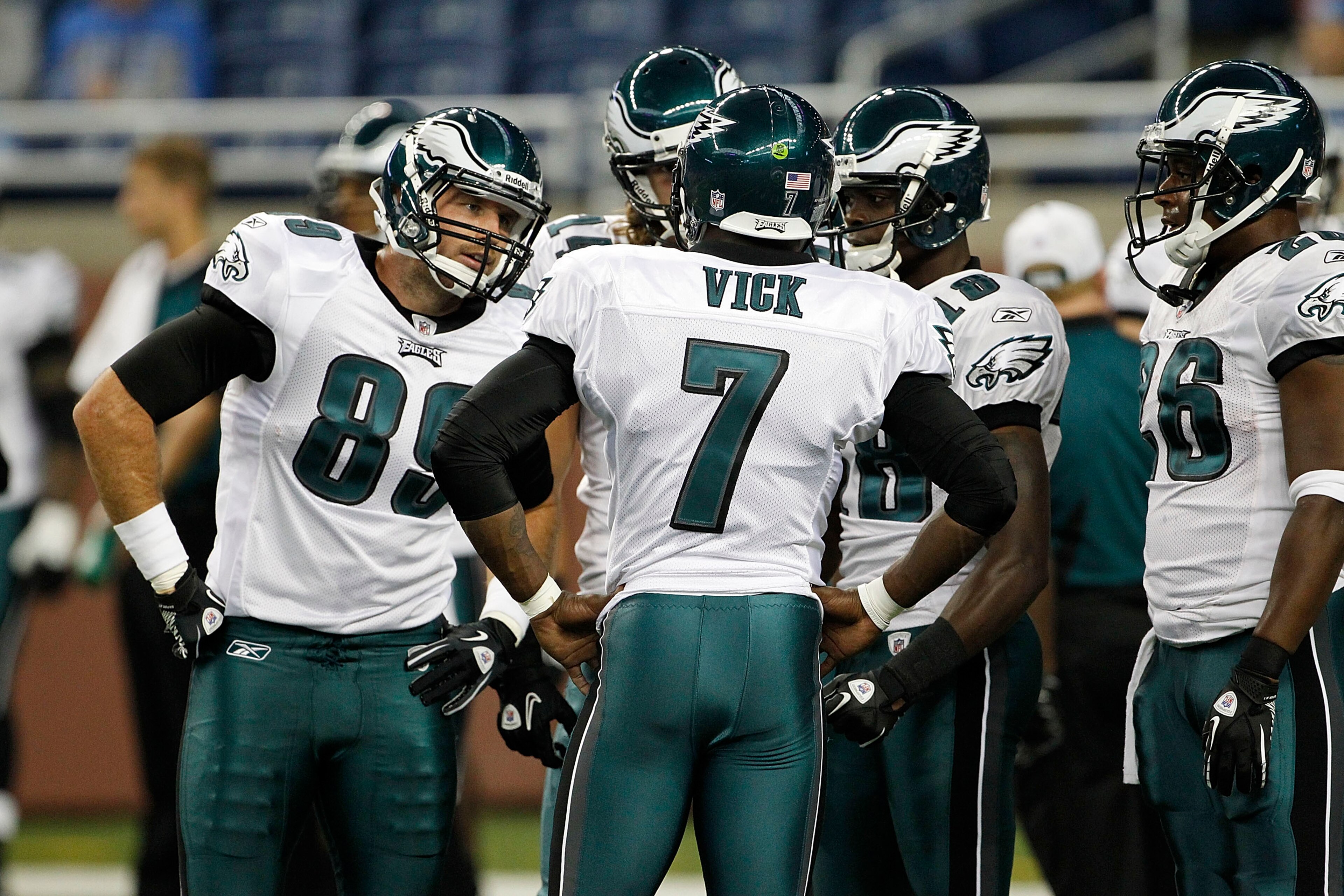 DETROIT - SEPTEMBER 19:  Michael Vick #7 of the Philadelphia Eagles calls the play in the huddle during warms up prior to the start of the game against the Detroit Lions at Ford Field on September 19, 2010 in Detroit, Michigan.  (Photo by Leon Halip/Getty