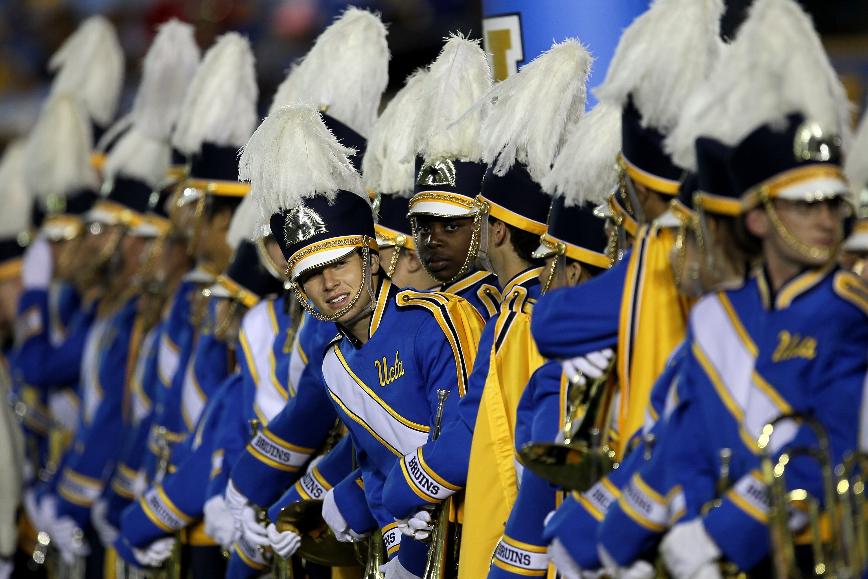 PASADENA, CA - SEPTEMBER 18: Members of the UCLA Bruins marching band wait to perform before the game with the Houston Cougars at the Rose Bowl on September 18, 2010 in Pasadena, California.   UCLA won 31-13.  (Photo by Stephen Dunn/Getty Images)