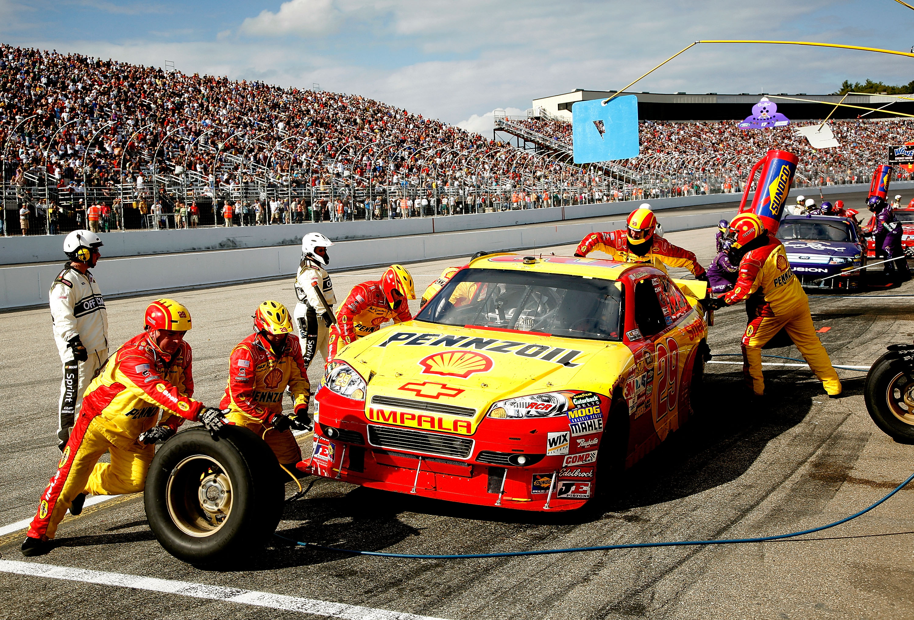 LOUDON, NH - SEPTEMBER 19: Kevin Harvick, driver of the #29 Shell / Pennzoil Chevrolet makes a pit stop during the NASCAR Sprint Cup Series Sylvania 300 at New Hampshire Motor Speedway on September 19, 2010 in Loudon, New Hampshire.  (Photo by Jerry Markl