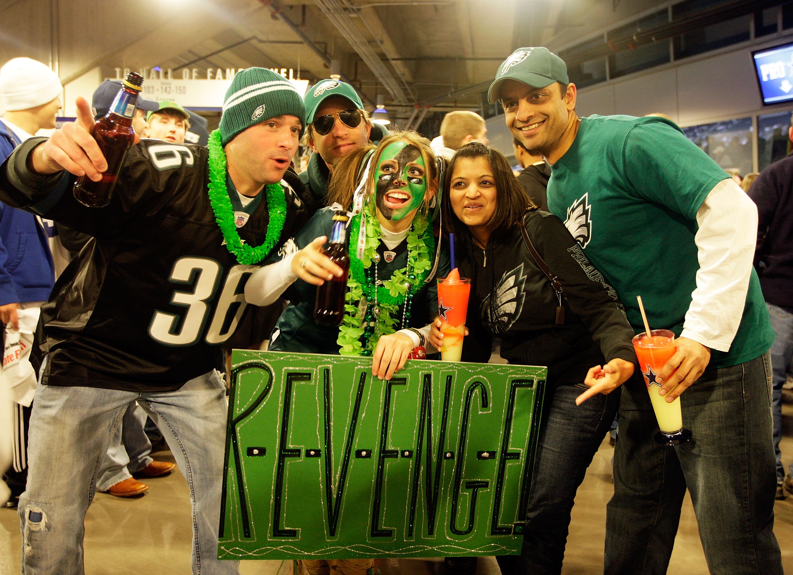 ARLINGTON, TX - JANUARY 09:  Philadelphia Eagles fans pose on the concourse prior to the start of the 2010 NFC wild-card playoff game against the Dallas Cowboys on January 9, 2010 at Cowboys Stadium in Arlington, Texas.  (Photo by Jamie Squire/Getty Image