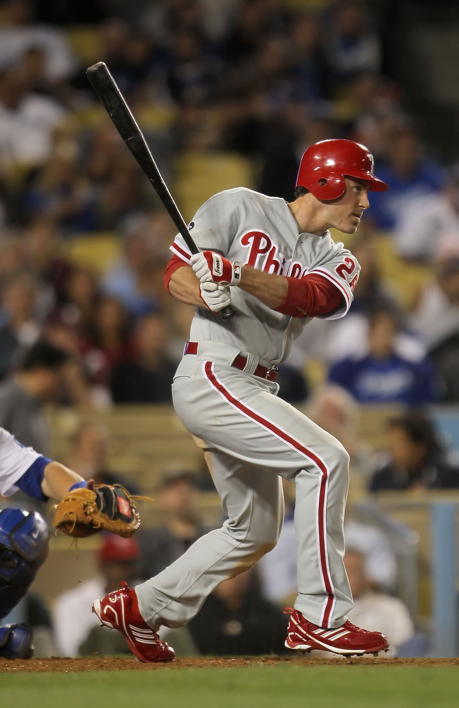 LOS ANGELES, CA - AUGUST 31:  Chase Utley #26 of the Philadelphia Phillies hits a base hit in the eighth inning against the Los Angeles Dodgers at Dodger Stadium on August 31, 2010 in Los Angeles, California. The Phillies defeated the Dodgers 8-4.  (Photo