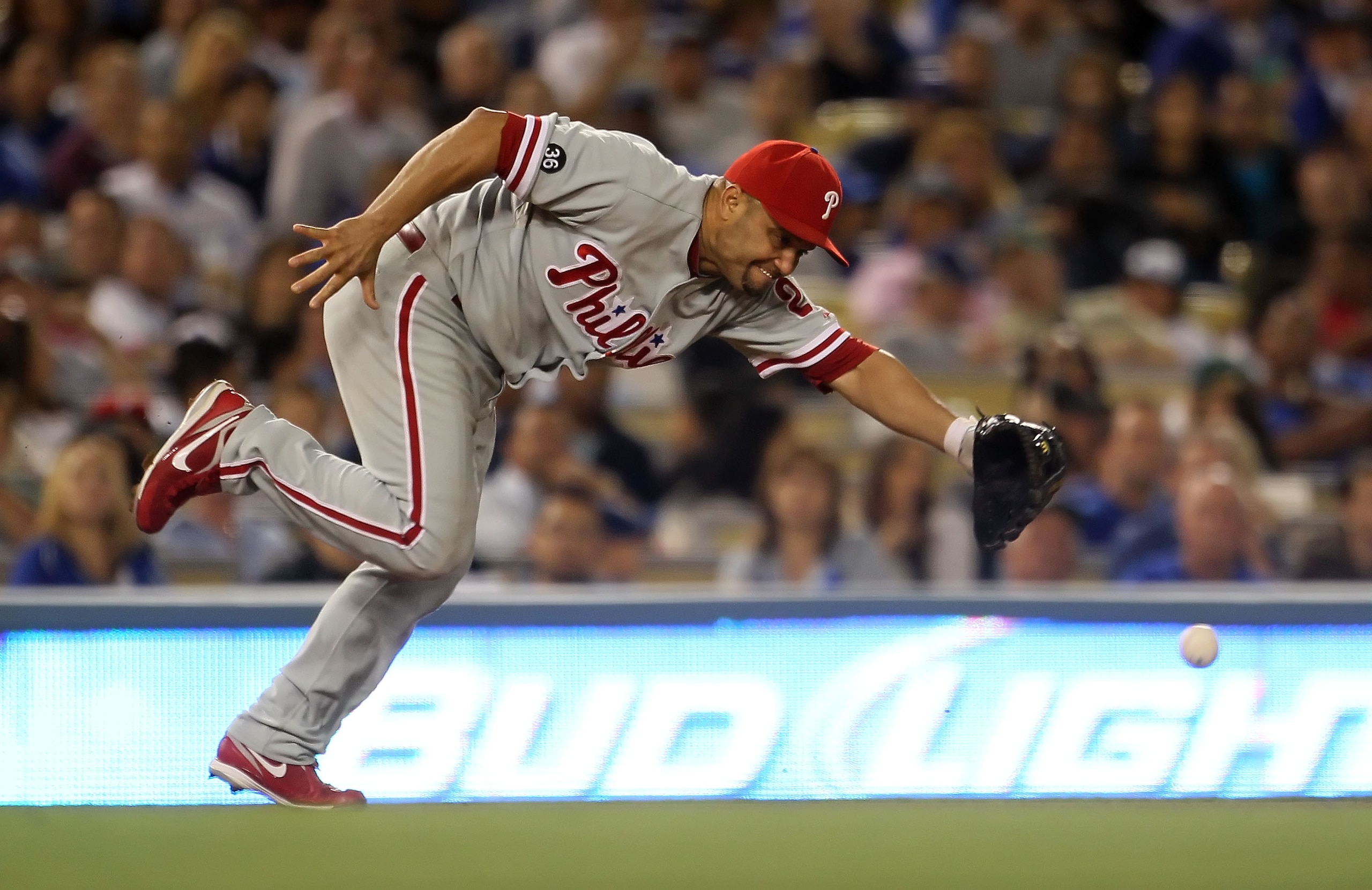 LOS ANGELES, CA - AUGUST 31: Third baseman Placido Polanco #27 of the Philadelphia Phillies lunges for a ball hit by Rod Barajas of the Los Angeles Dodgers in the fifth inning at Dodger Stadium on August 31, 2010 in Los Angeles, California. The Phillies LOS ANGELES, CA - AUGUST 31: Third baseman Placido Polanco #27 of the Philadelphia Phillies lunges for a ball hit by Rod Barajas of the Los Angeles Dodgers in the fifth inning at Dodger Stadium on August 31, 2010 in Los Angeles, California. The Phillies