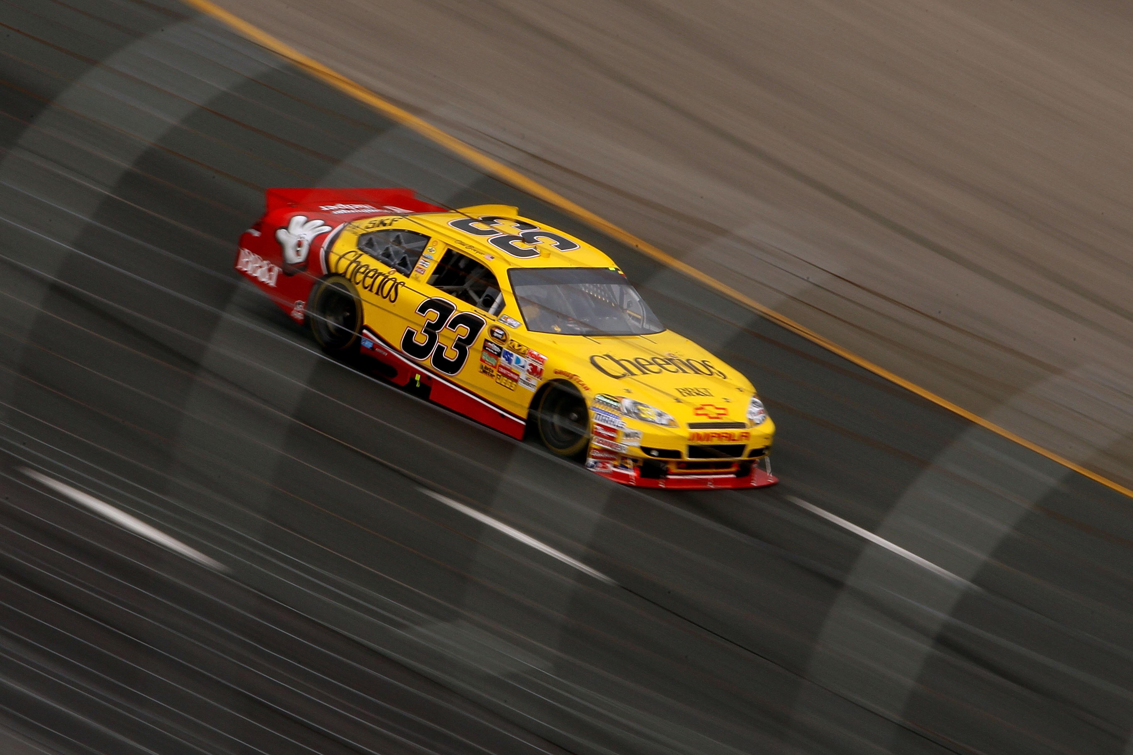LOUDON, NH - SEPTEMBER 19:  Clint Bowyer, driver of the #33 Cheerios / Hamburger Helper Chevrolet, races during the NASCAR Sprint Cup Series Sylvania 300 at New Hampshire Motor Speedway on September 19, 2010 in Loudon, New Hampshire.  (Photo by Elsa/Getty