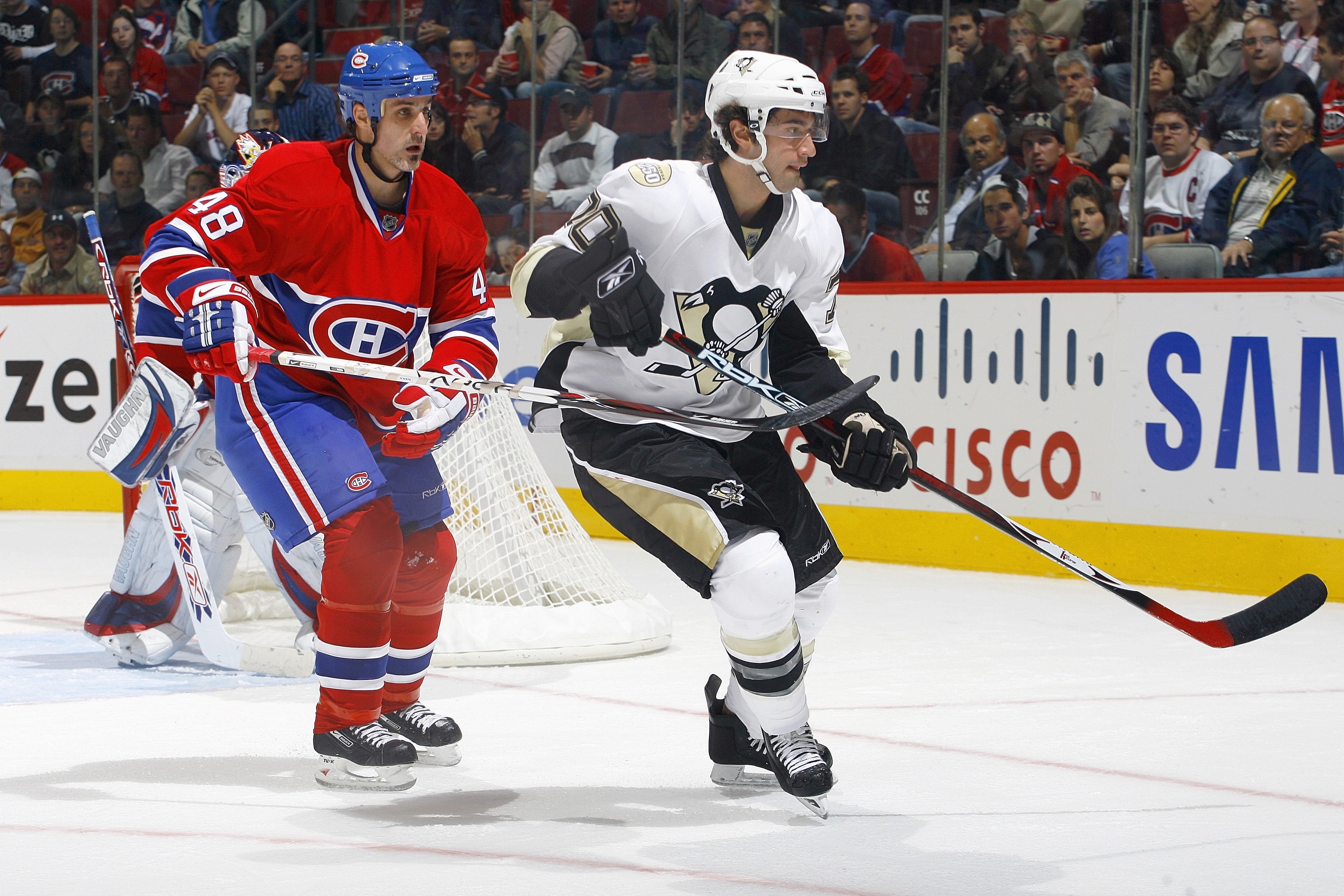 MONTREAL - SEPTEMBER 18: Jamie Rivers #48 of the Montreal Canadiens defends Angelo Esposito #70 of the Pittsburgh Penguins during their pre-season game on September 18, 2007 at the Bell Centre in Montreal, Quebec, Canada. The Penguins defeated the Canadi MONTREAL - SEPTEMBER 18: Jamie Rivers #48 of the Montreal Canadiens defends Angelo Esposito #70 of the Pittsburgh Penguins during their pre-season game on September 18, 2007 at the Bell Centre in Montreal, Quebec, Canada. The Penguins defeated the Canadi