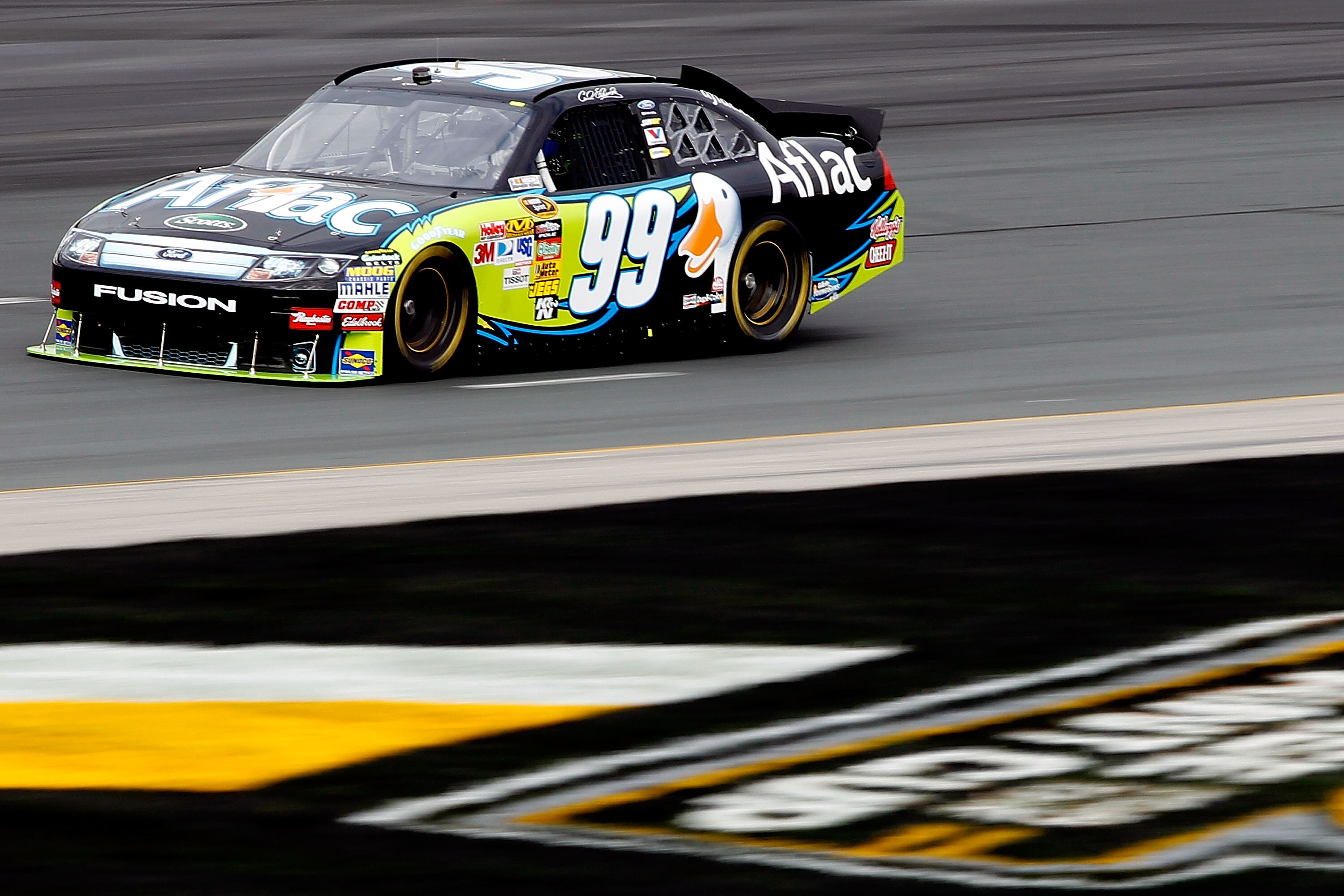 LOUDON, NH - SEPTEMBER 18:  Carl Edwards, driver of the #99 Aflac Ford, drives on track during practice for the NASCAR Sprint Cup Series Sylvania 300 at New Hampshire Motor Speedway on September 18, 2010 in Loudon, New Hampshire.  (Photo by Todd Warshaw/G
