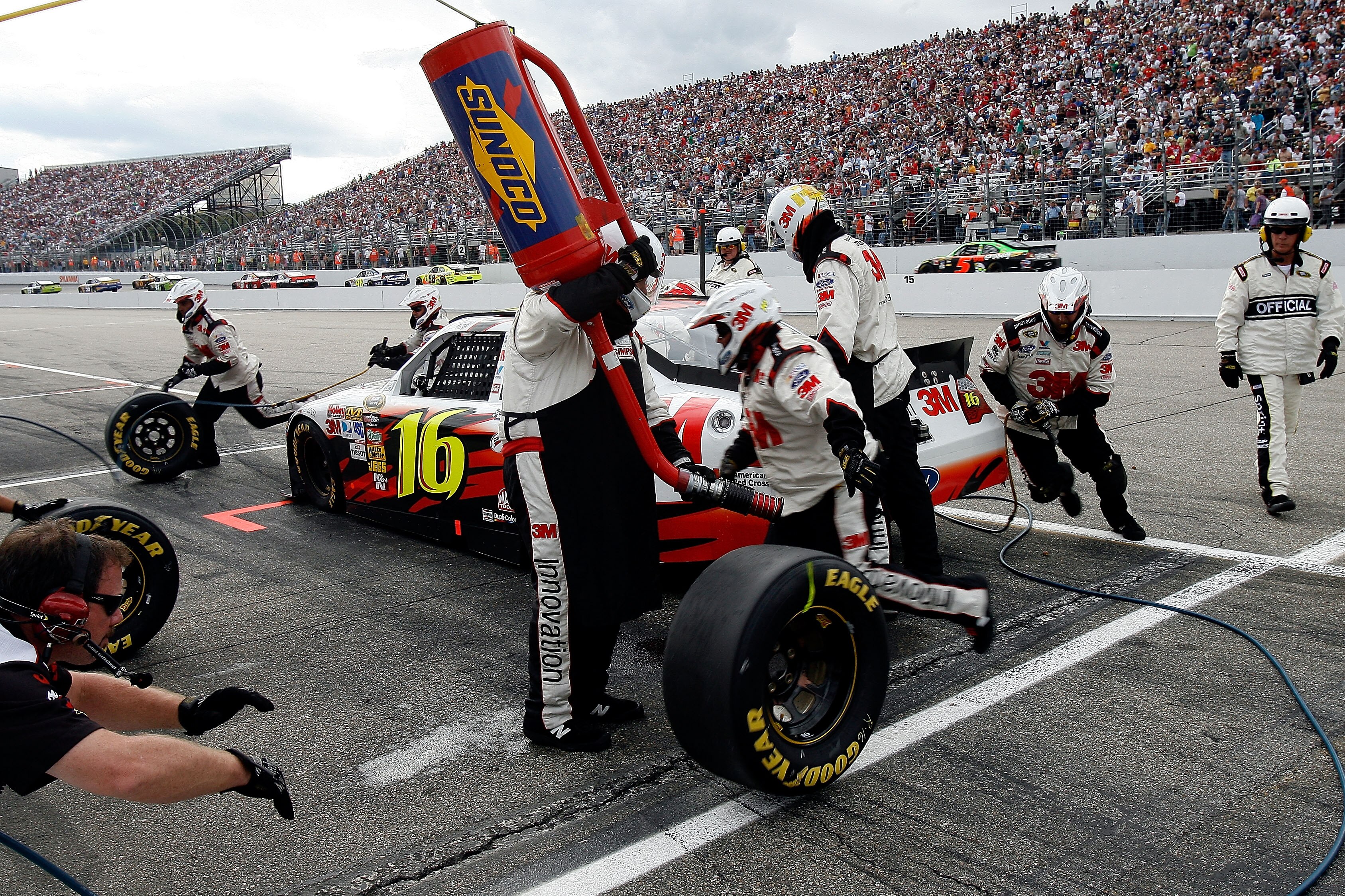 LOUDON, NH - SEPTEMBER 19:  Greg Biffle, driver of the #16 3M Ford, comes in for a pit stop during the NASCAR Sprint Cup Series Sylvania 300 at New Hampshire Motor Speedway on September 19, 2010 in Loudon, New Hampshire.  (Photo by Tom Whitmore/Getty Imag