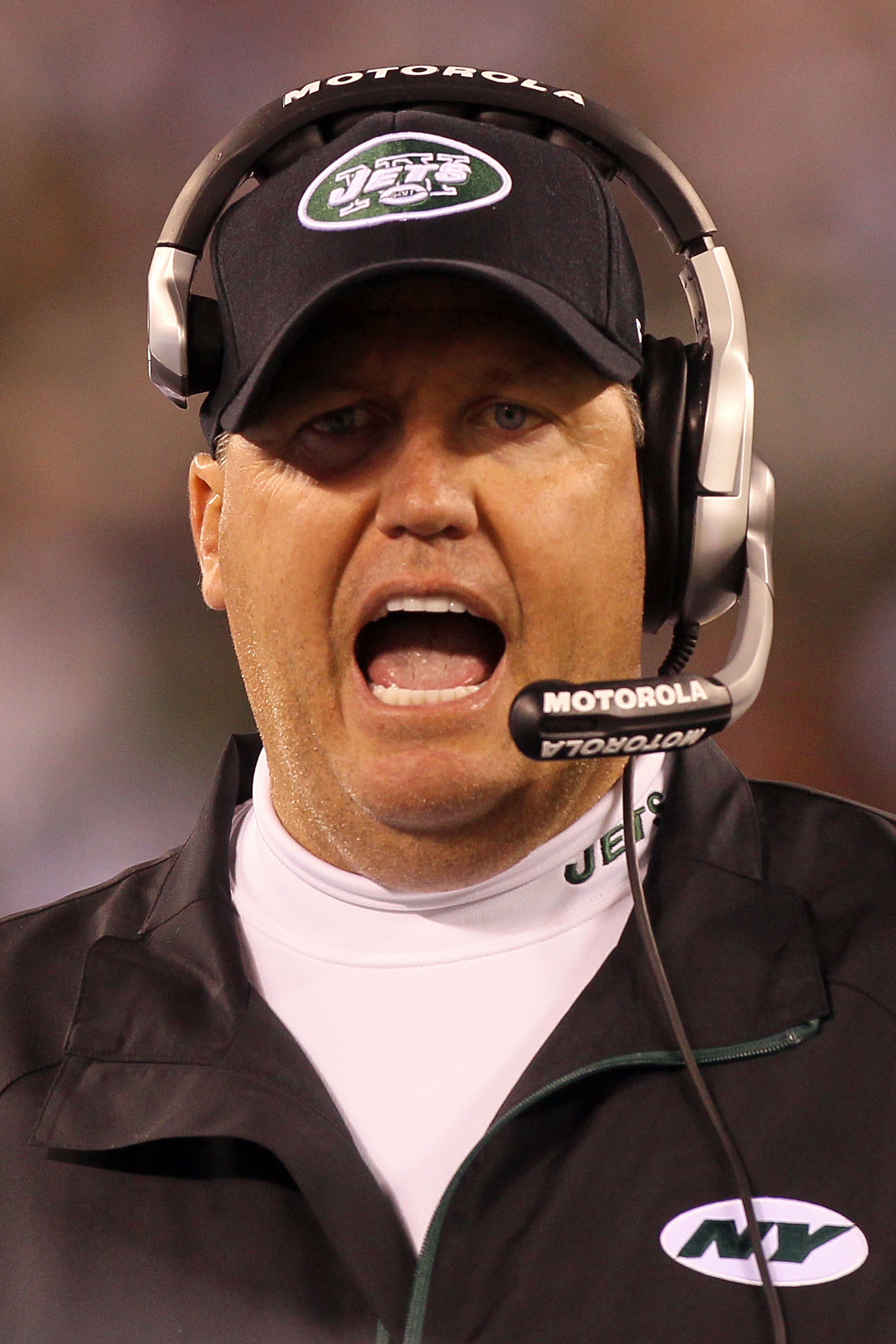 EAST RUTHERFORD, NJ - SEPTEMBER 13:  Head coach Rex Ryan of the New York Jets yells from the sideline during their home opener against the Baltimore Ravens at the New Meadowlands Stadium on September 13, 2010 in East Rutherford, New Jersey.  (Photo by Jim