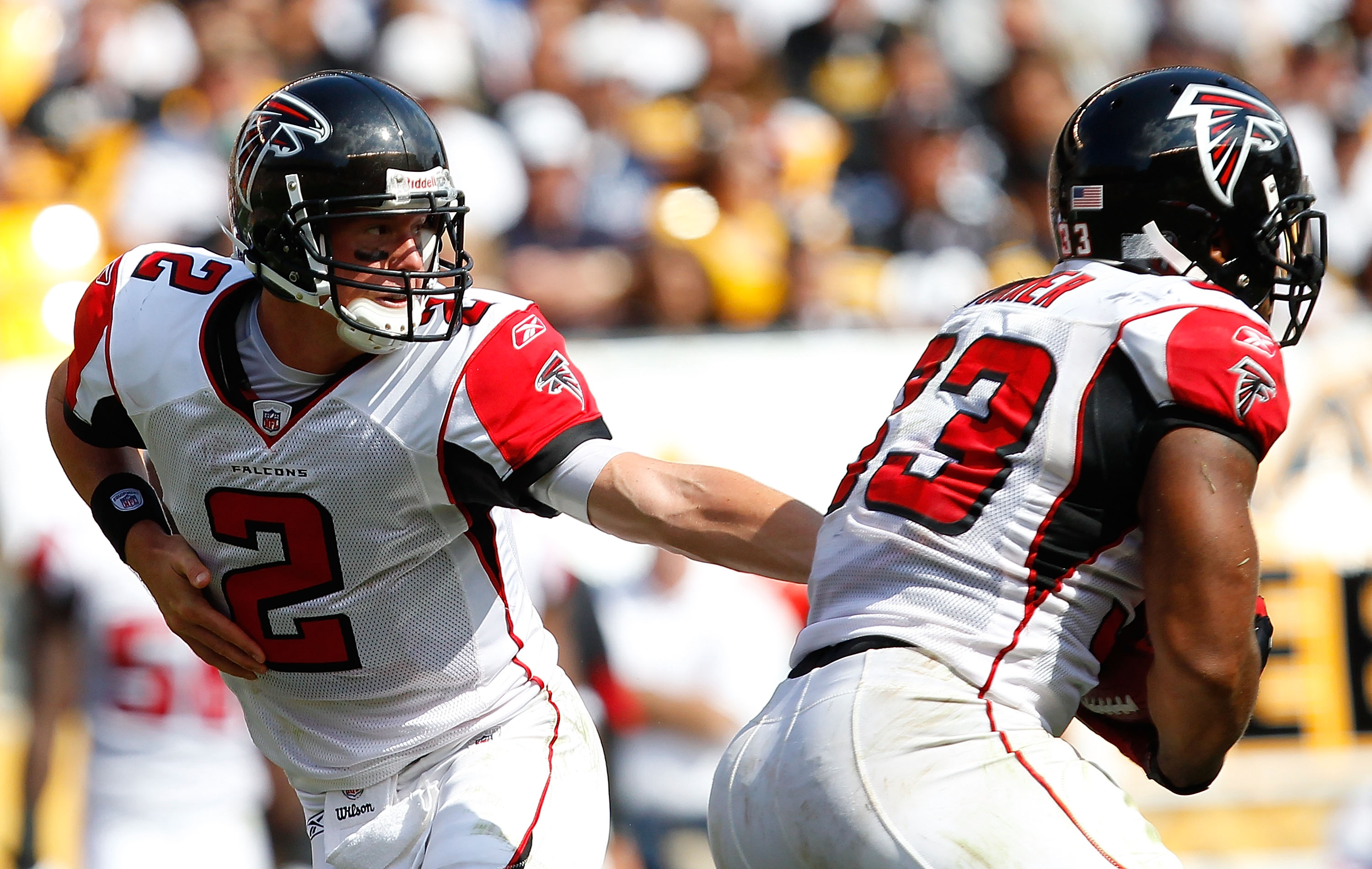 PITTSBURGH - SEPTEMBER 12:  Matt Ryan #2 of the Atlanta Falcons hands the ball off to Michael Turner #33 against the Pittsburgh Steelers during the NFL season opener game on September 12, 2010 at Heinz Field in Pittsburgh, Pennsylvania.  (Photo by Jared W