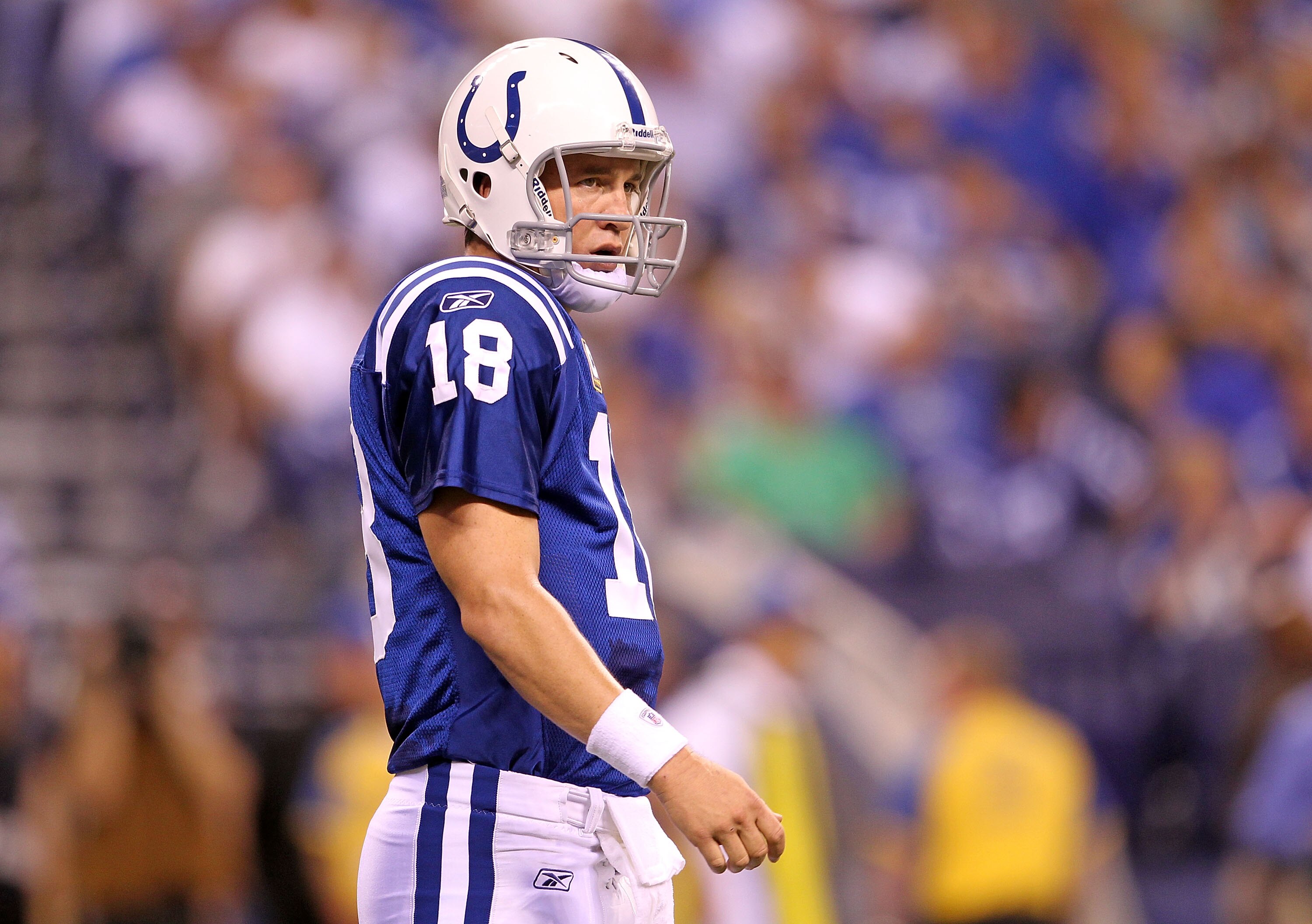 INDIANAPOLIS - SEPTEMBER 19:  Peyton Manning #18 of the Indianapolis Colts  waits for a paly call from the bench during the NFL game against the New York Giants  at Lucas Oil Stadium on September 19, 2010 in Indianapolis, Indiana.  (Photo by Andy Lyons/Ge