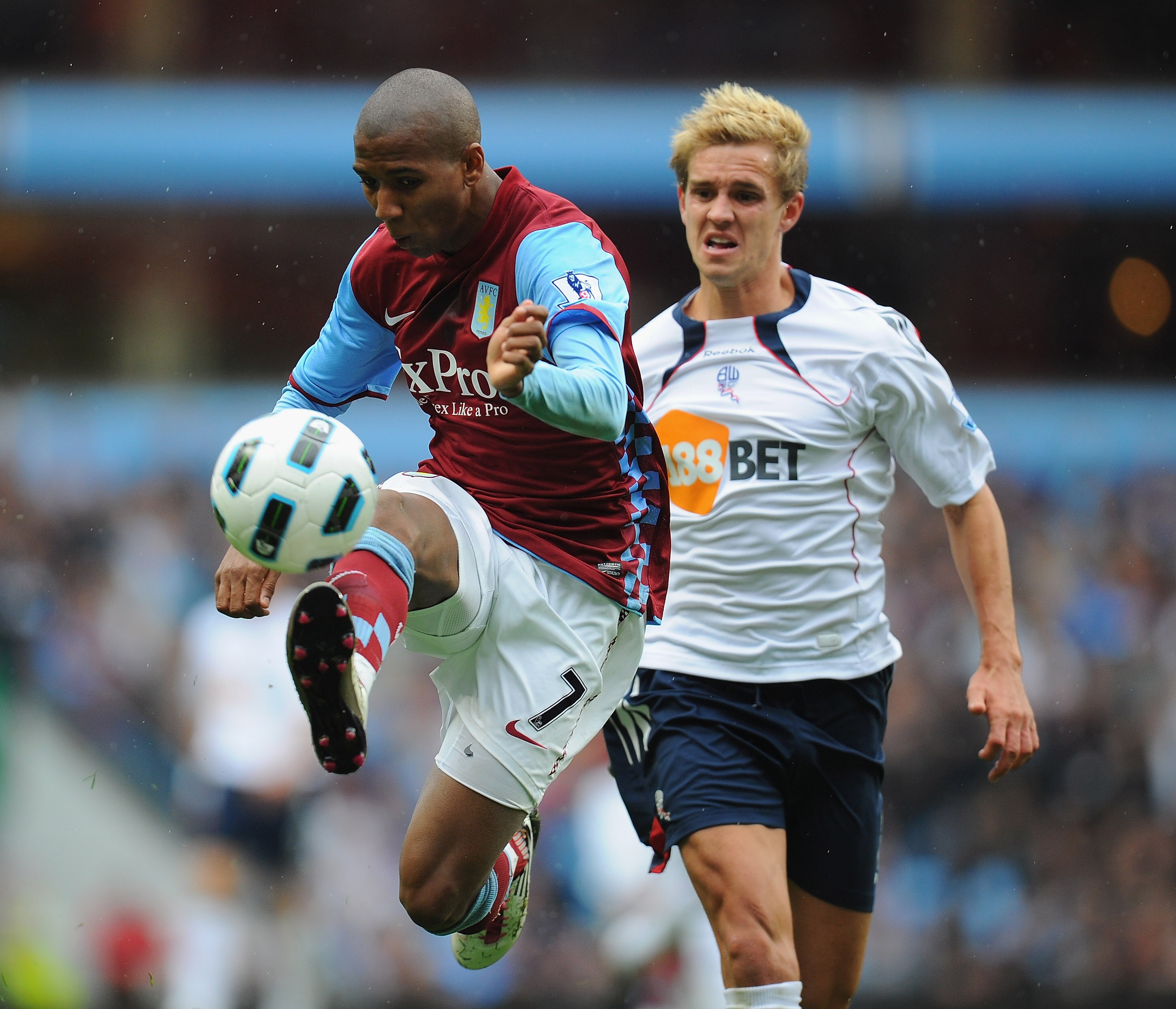 BIRMINGHAM, ENGLAND - SEPTEMBER 18:  Ashley Young of Aston Villa controls the ball during the Barclays Premier League match between Aston villa and Bolton Wanderers at Villa Park on September 18, 2010 in Birmingham, England.  (Photo by Clive Mason/Getty I
