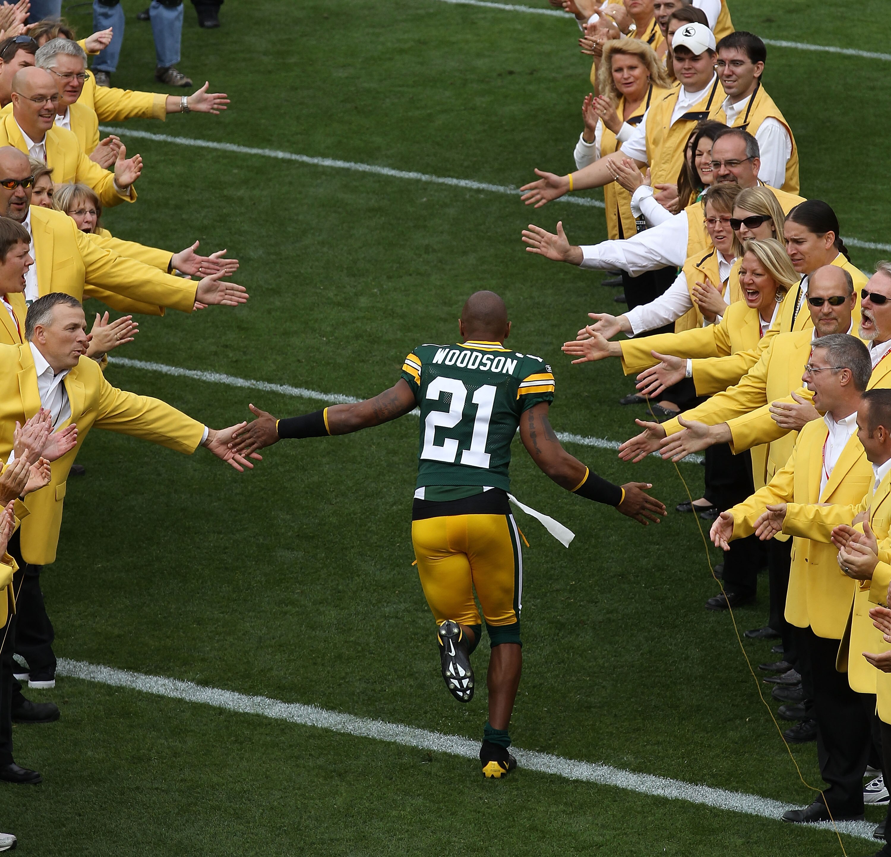 GREEN BAY, WI - SEPTEMBER 19: Charles Woodson #21 of the Green Bay Packers runs onto the field during player introductions before a game against the Buffalo Bills at Lambeau Field on September 19, 2010 in Green Bay, Wisconsin. (Photo by Jonathan Daniel/Ge GREEN BAY, WI - SEPTEMBER 19: Charles Woodson #21 of the Green Bay Packers runs onto the field during player introductions before a game against the Buffalo Bills at Lambeau Field on September 19, 2010 in Green Bay, Wisconsin. (Photo by Jonathan Daniel/Ge