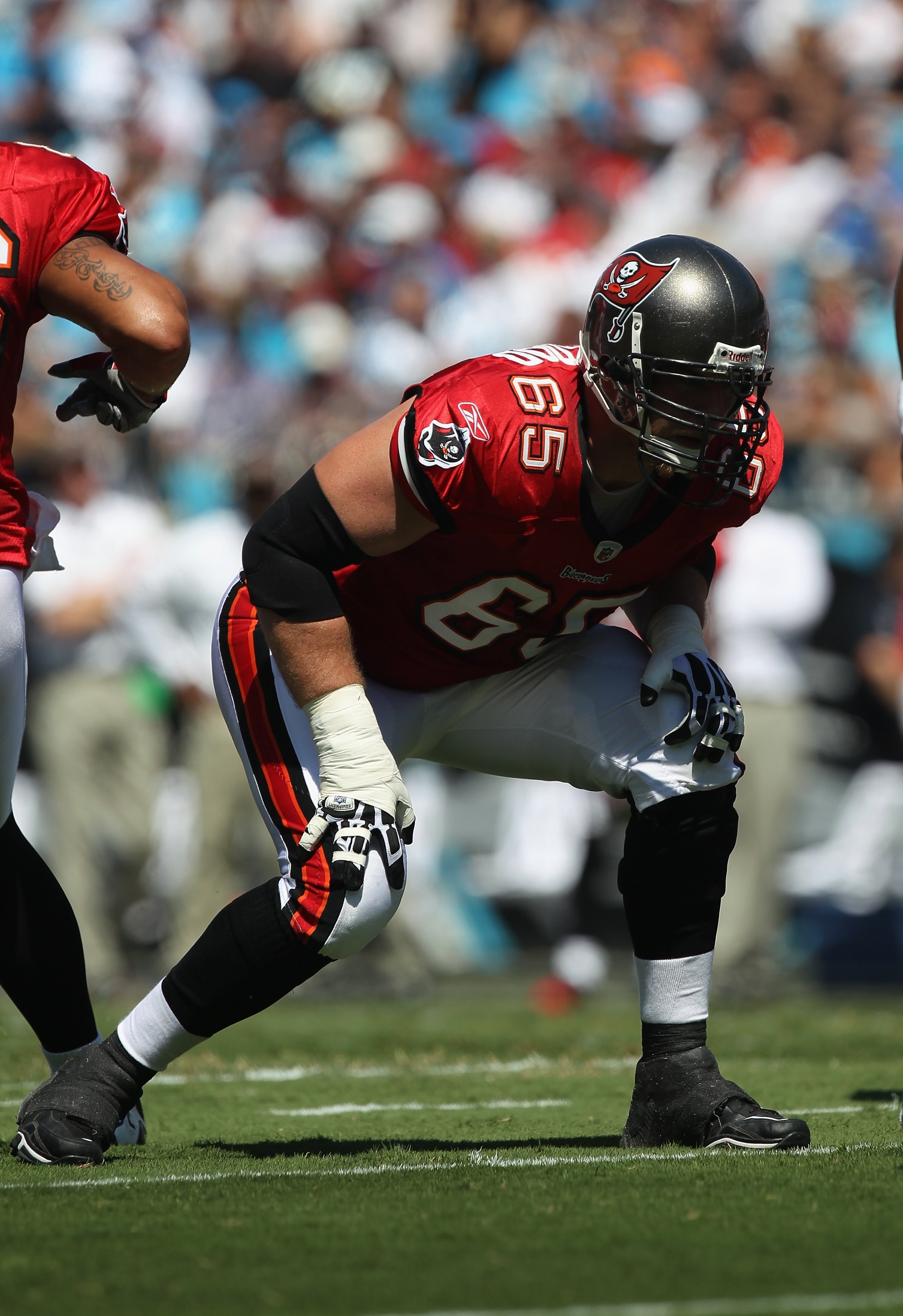 CHARLOTTE, NC - SEPTEMBER 19:  Jeremy Trueblood #65 of the Tampa Bay Buccaneers against the Carolina Panthers during their game at Bank of America Stadium on September 19, 2010 in Charlotte, North Carolina.  (Photo by Streeter Lecka/Getty Images)
