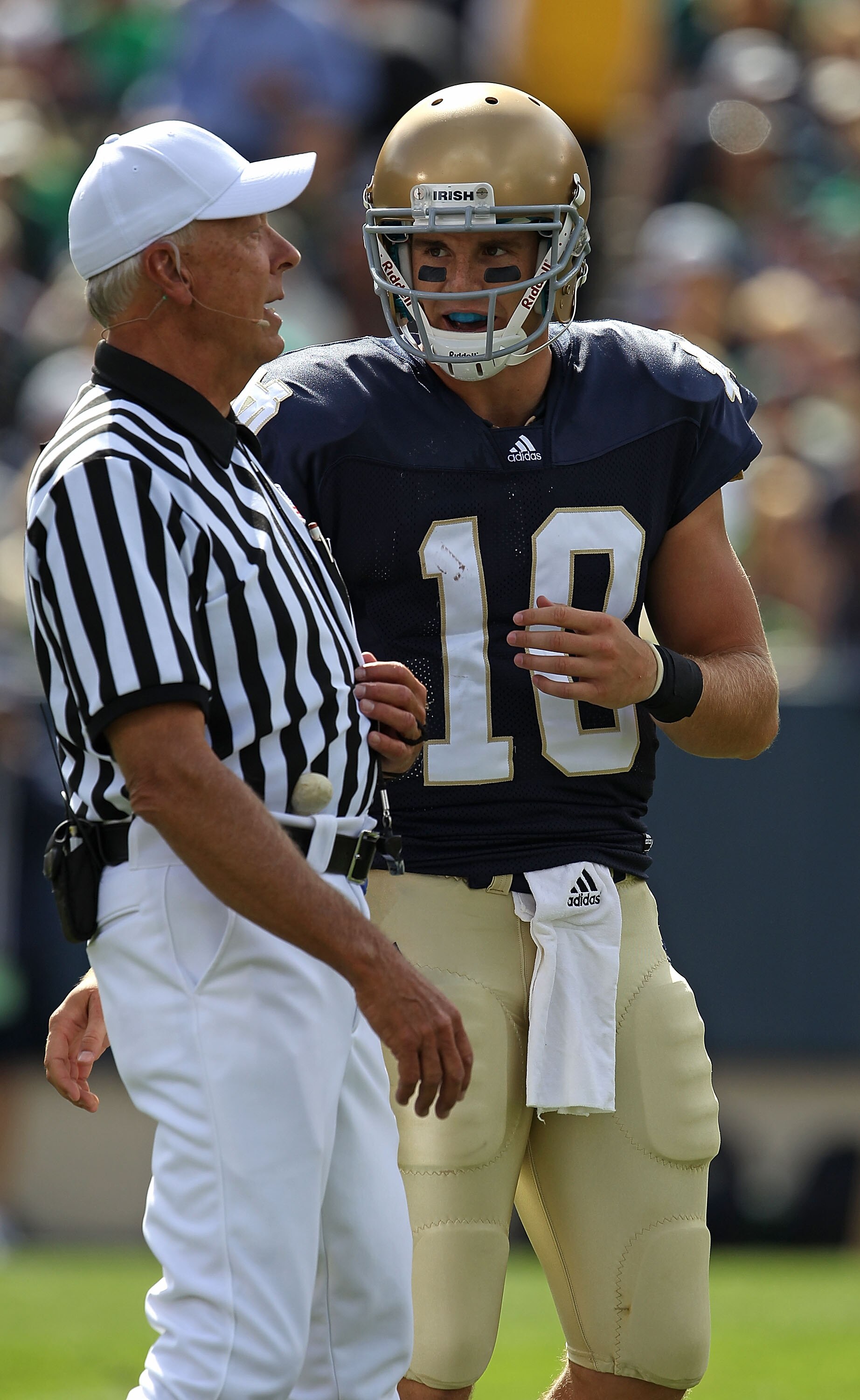 SOUTH BEND, IN - SEPTEMBER 04: Dayne Crist #10 of the Notre Dame Fighting Irish talks to a referee during a game against the Purdue Boilermakers at Notre Dame Stadium on September 4, 2010 in South Bend, Indiana. Notre Dame defeated Purdue 23-12.  (Photo b