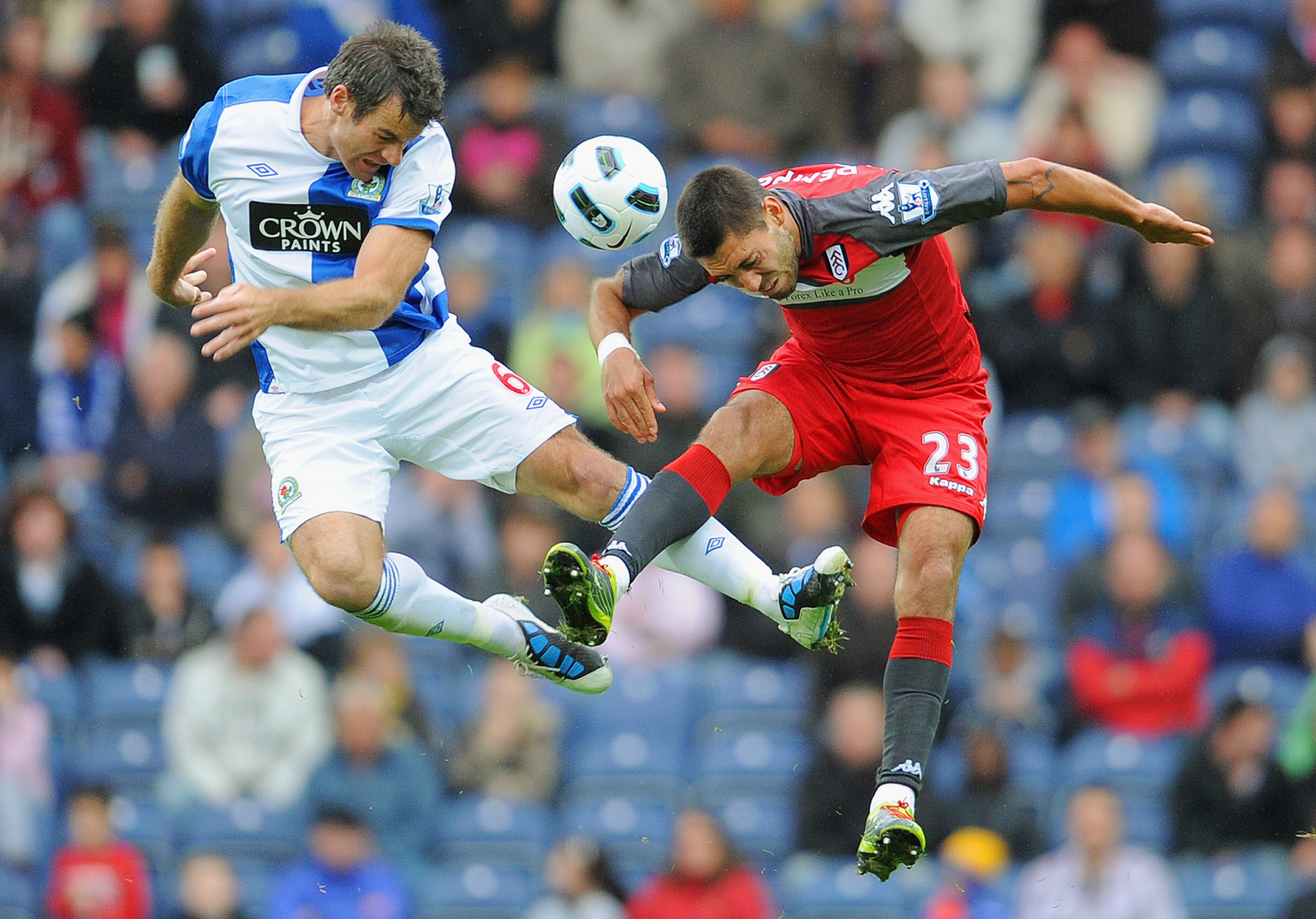 BLACKBURN, ENGLAND - SEPTEMBER 18: Clint Dempsey of Fulham battles  Ryan Nelson of Blackburn during the Barclays Premier League match between Blackburn Rovers and Fulham at Ewood park on September 18, 2010 in Blackburn, England.  (Photo by Michael Regan/G