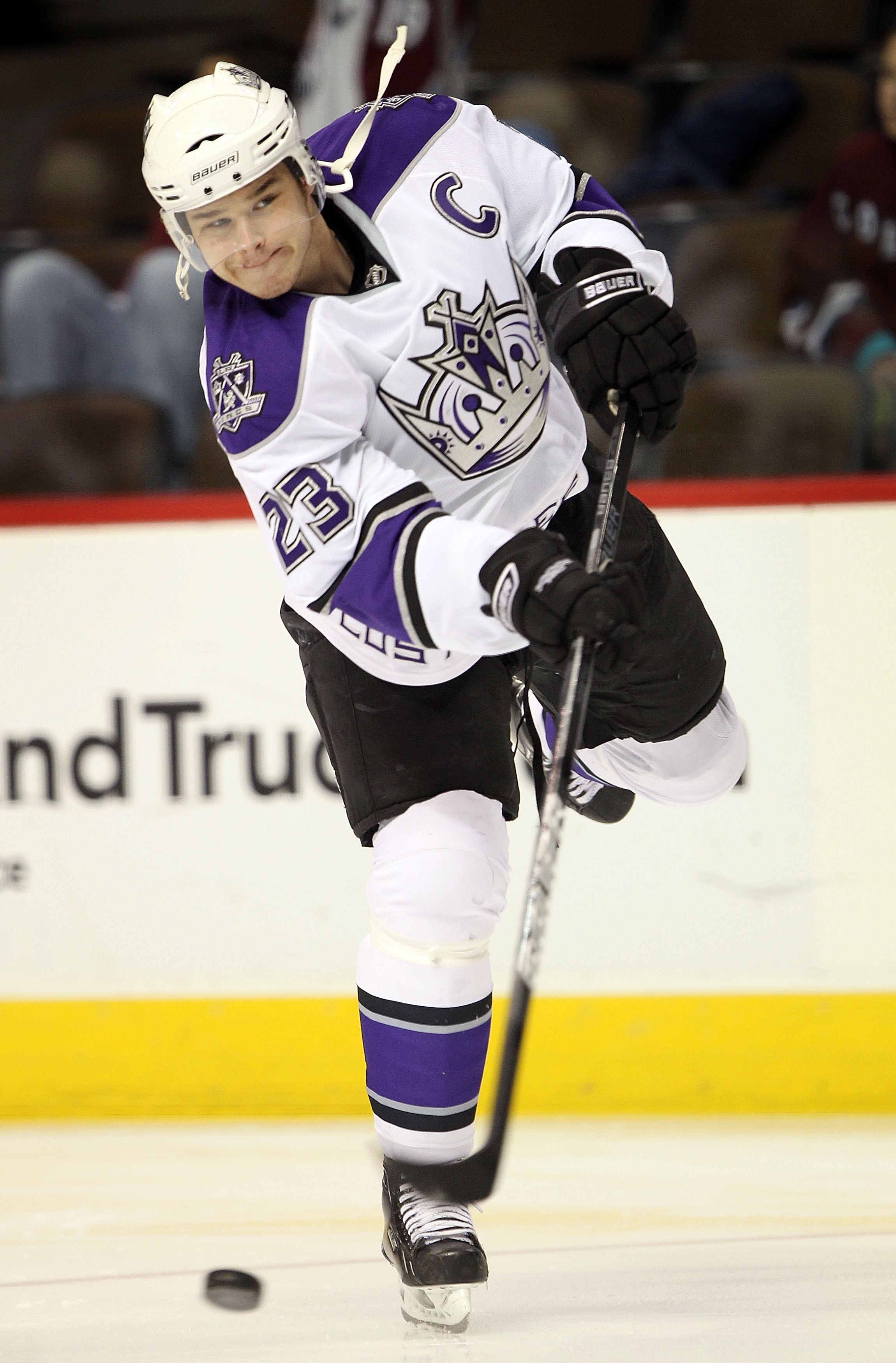 DENVER - MARCH 24:  Captain Dustin Brown #23 of the Los Angeles Kings warms up prior to facing the Colorado Avalanche during NHL action at the Pepsi Center on March 24, 2010 in Denver, Colorado. The Avalanche defeated the Kings 4-3 in an overtime shootout