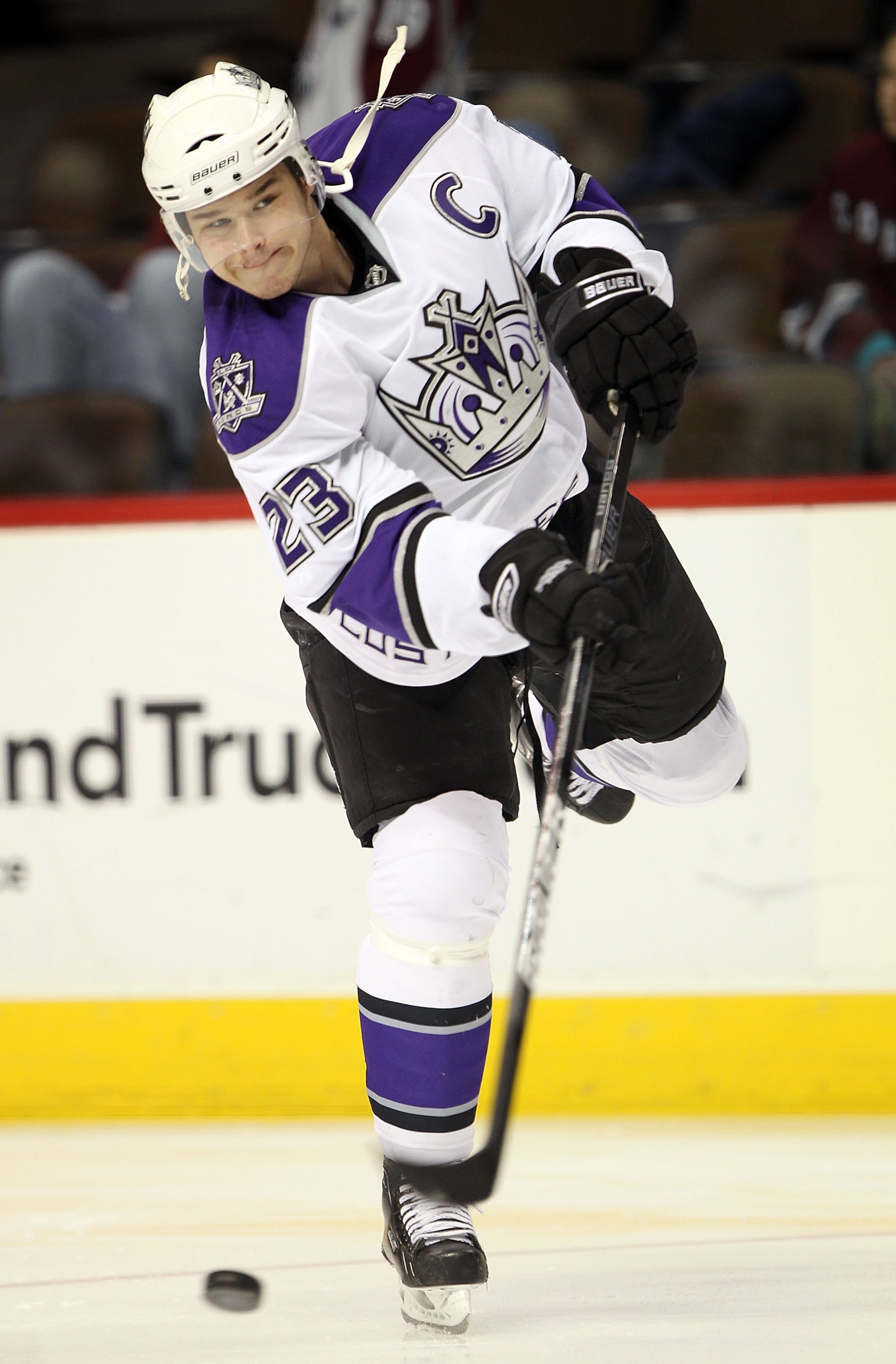 DENVER - MARCH 24:  Captain Dustin Brown #23 of the Los Angeles Kings warms up prior to facing the Colorado Avalanche during NHL action at the Pepsi Center on March 24, 2010 in Denver, Colorado. The Avalanche defeated the Kings 4-3 in an overtime shootout