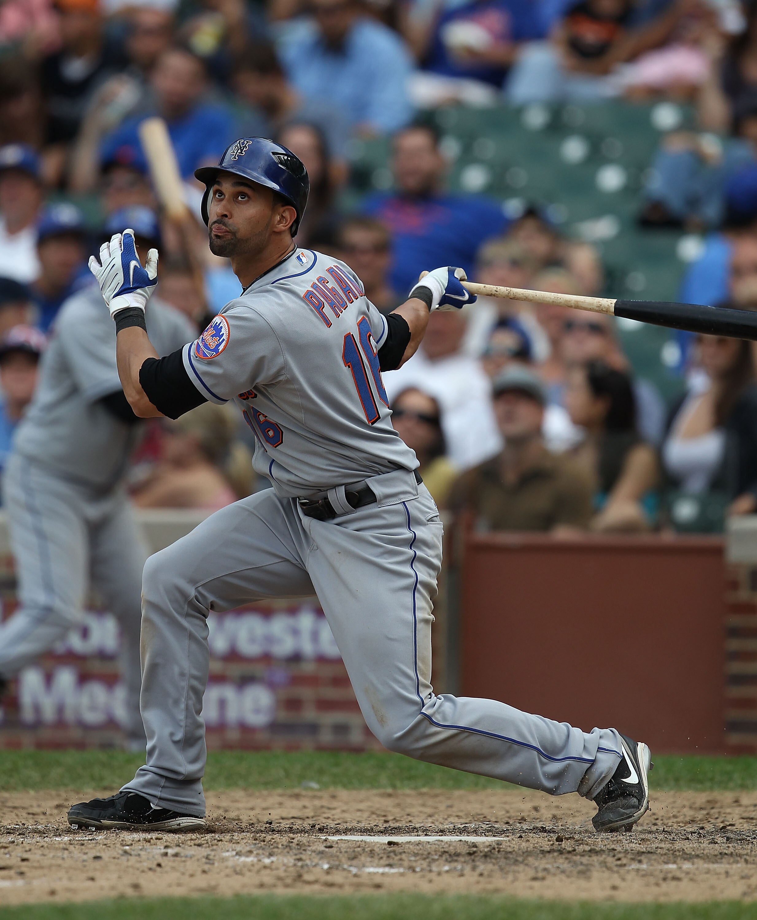 CHICAGO - SEPTEMBER 05: Angel Pagan #16 of the New York Mets takes a swing against the Chicago Cubs at Wrigley Field on September 5, 2010 in Chicago, Illinois. The Mets defeated the Cubs 18-5. (Photo by Jonathan Daniel/Getty Images)