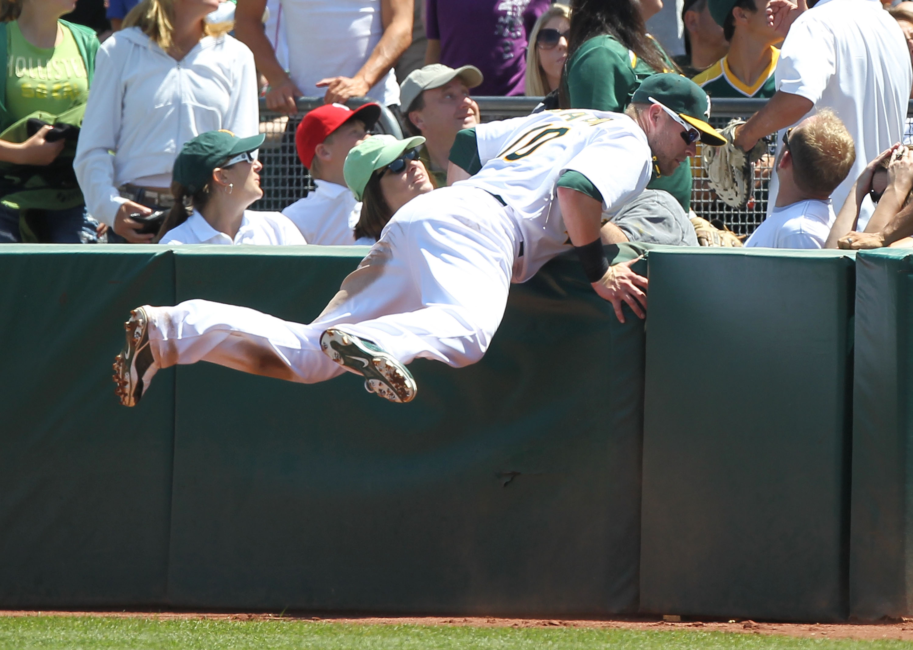 OAKLAND, CA - AUGUST 08:  Daric Barton #10  of the Oakland Athletics misses a foul ball hit by Nelson Cruz of the Texas Rangers in the fourth inning during an MLB game at the Oakland-Alameda County Coliseum on August 8, 2010 in Oakland, California.  (Phot