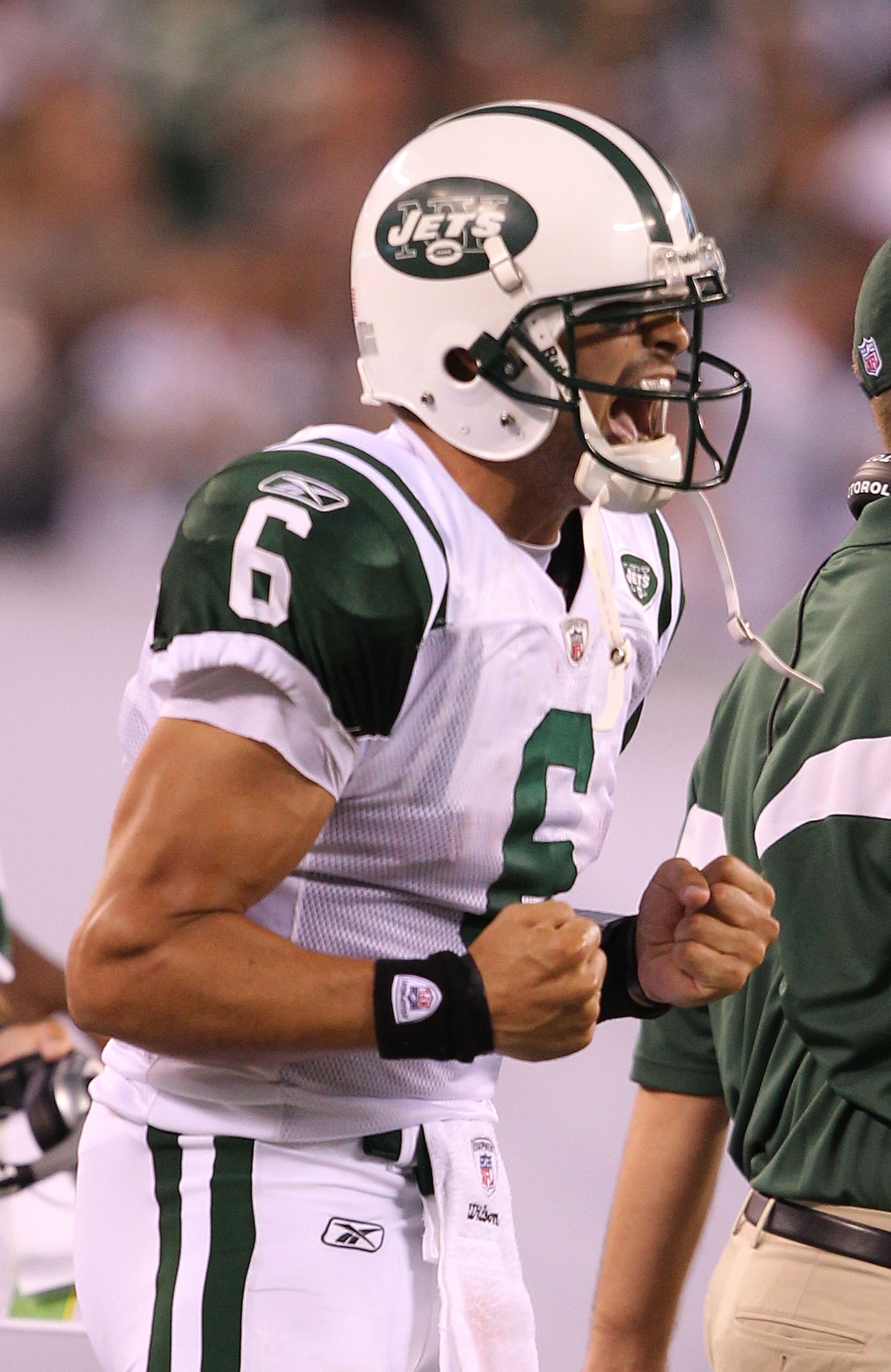 EAST RUTHERFORD, NJ - SEPTEMBER 19:  Mark Sanchez #6 of the New York Jets celebrates a touchdown against the New England Patriots during their  game on September 19, 2010 at the New Meadowlands Stadium  in East Rutherford, New Jersey.  (Photo by Al Bello/