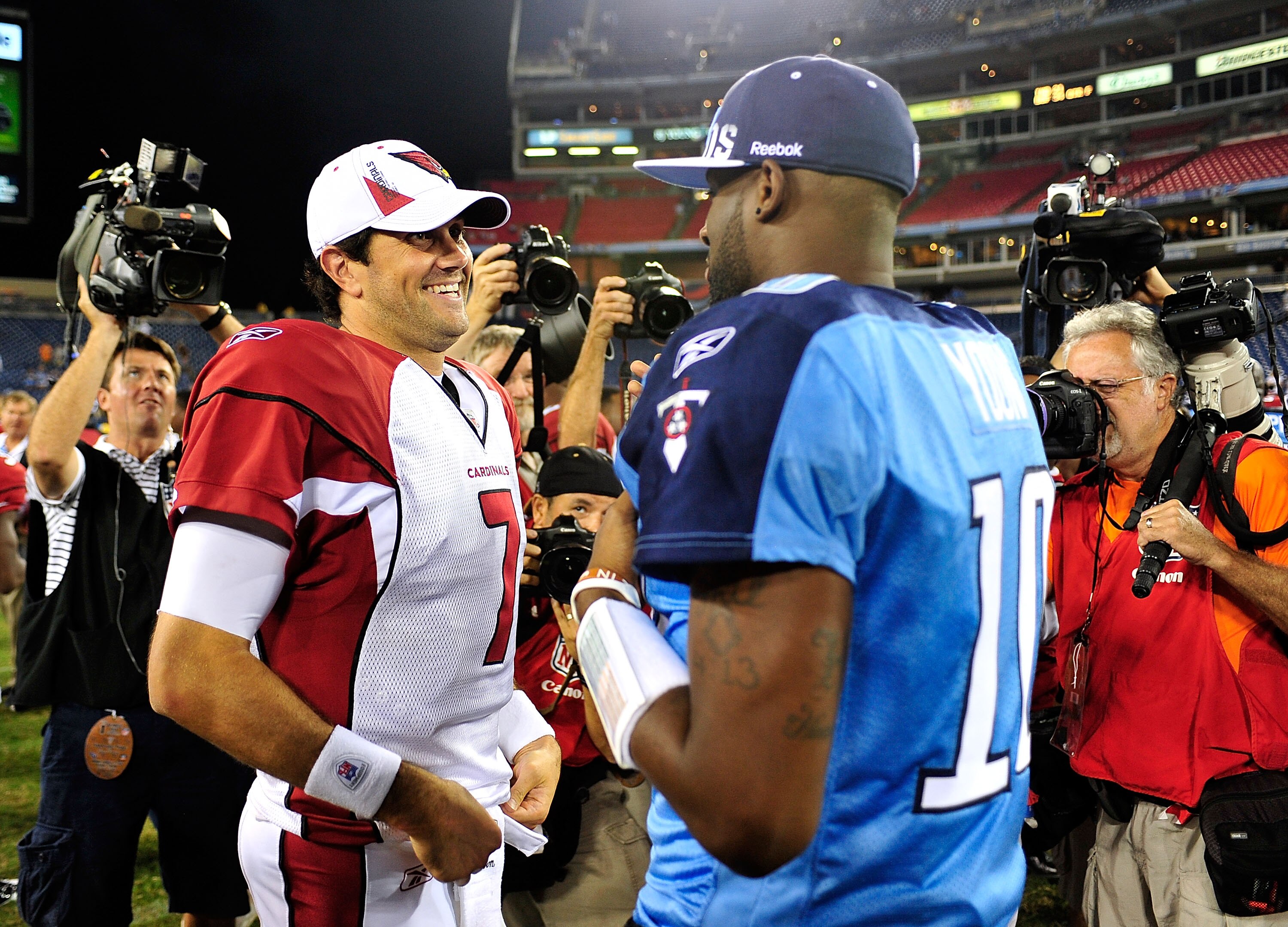 NASHVILLE, TN - AUGUST 23:  Quarterbacks Vince Young #10 of the Tennessee Titans and Matt Leinart #7 of the Arizona Cardinals talk after a preseason game at LP Field on August 23, 2010 in Nashville, Tennessee. Tennessee defeated Arizona, 24-10.  (Photo by