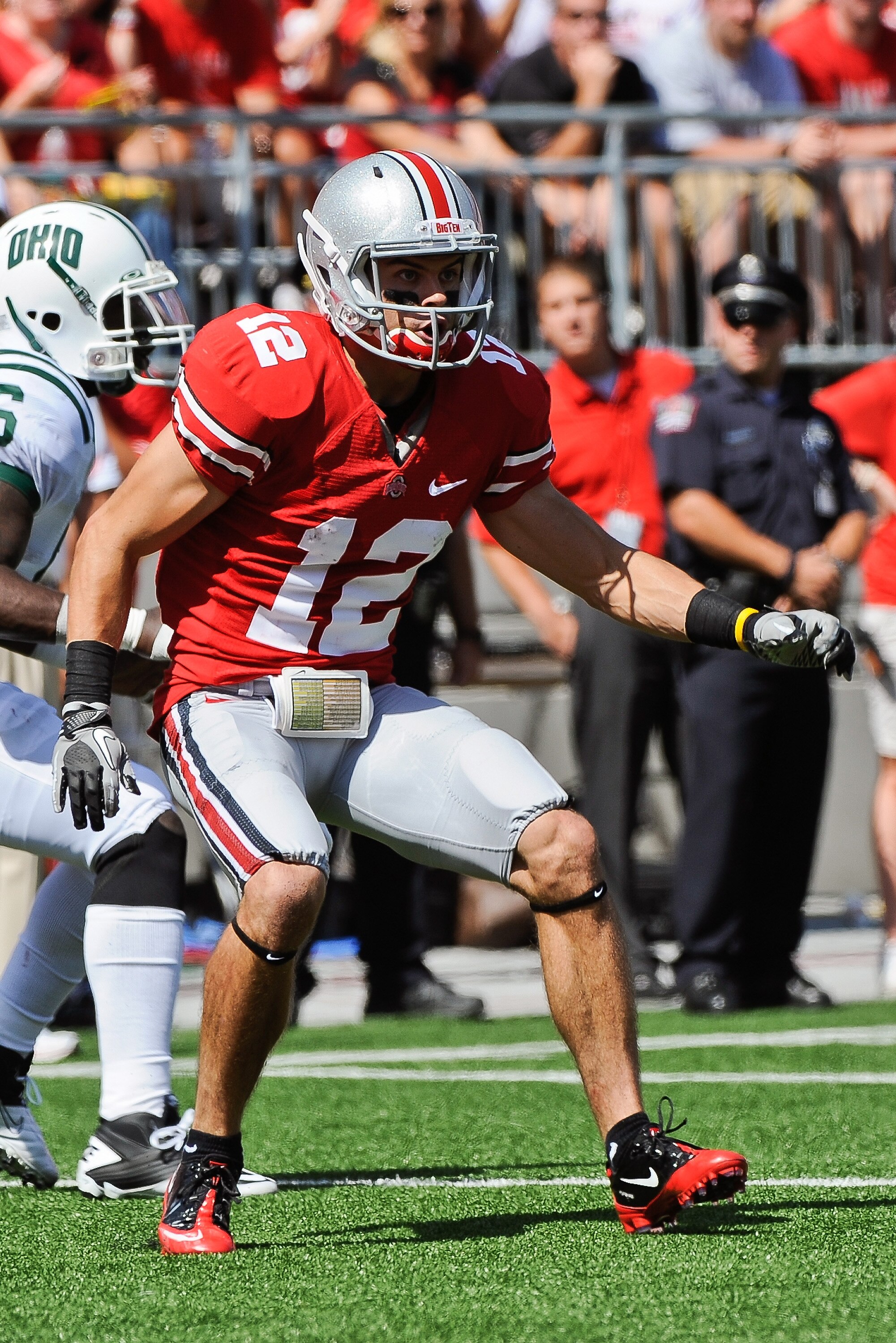 COLUMBUS, OH - SEPTEMBER 18:  Dane Sanzenbacher #12 of the Ohio State Buckeyes blocks downfield against the Ohio Bobcats at Ohio Stadium on September 18, 2010 in Columbus, Ohio.  (Photo by Jamie Sabau/Getty Images)