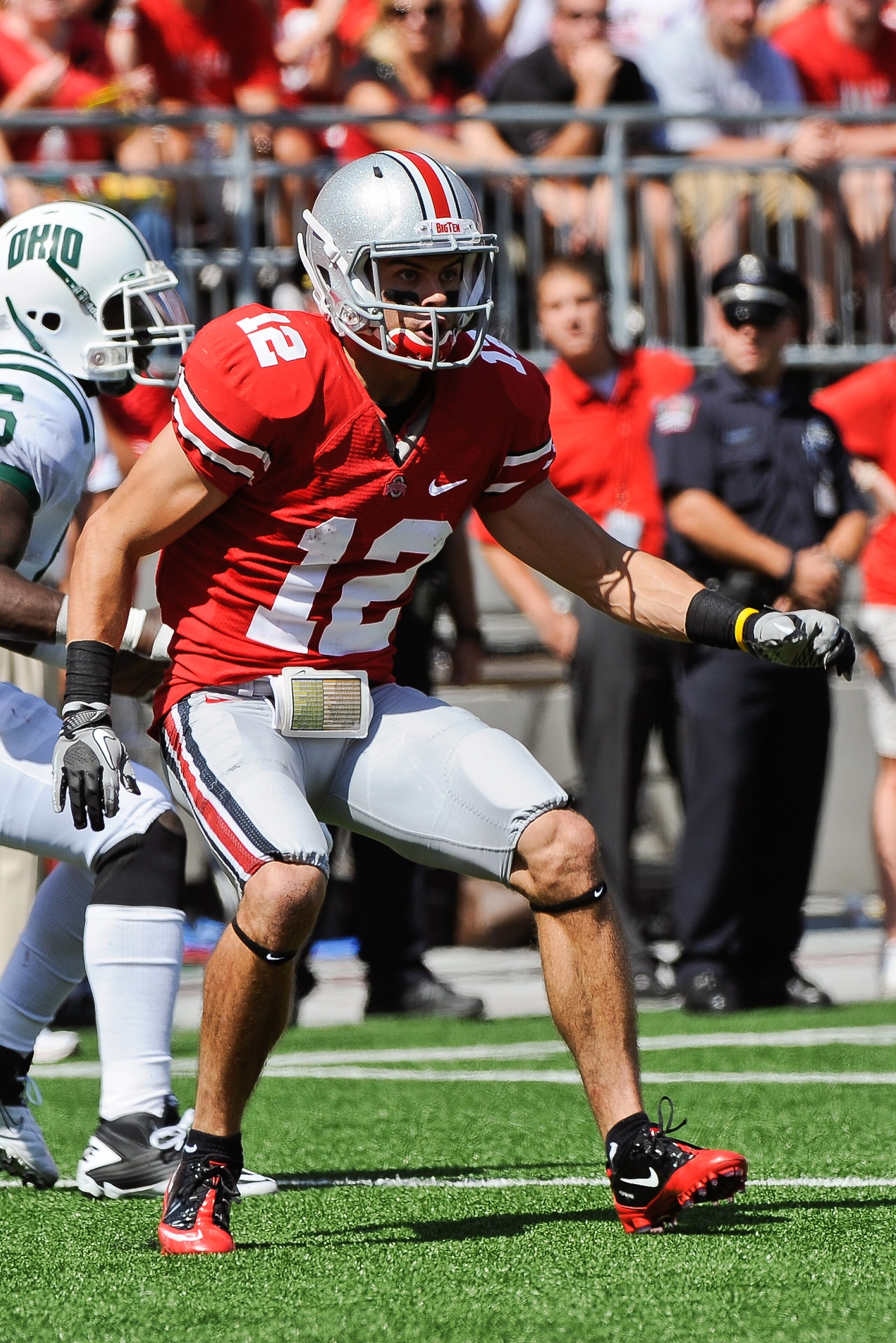 COLUMBUS, OH - SEPTEMBER 18:  Dane Sanzenbacher #12 of the Ohio State Buckeyes blocks downfield against the Ohio Bobcats at Ohio Stadium on September 18, 2010 in Columbus, Ohio.  (Photo by Jamie Sabau/Getty Images)