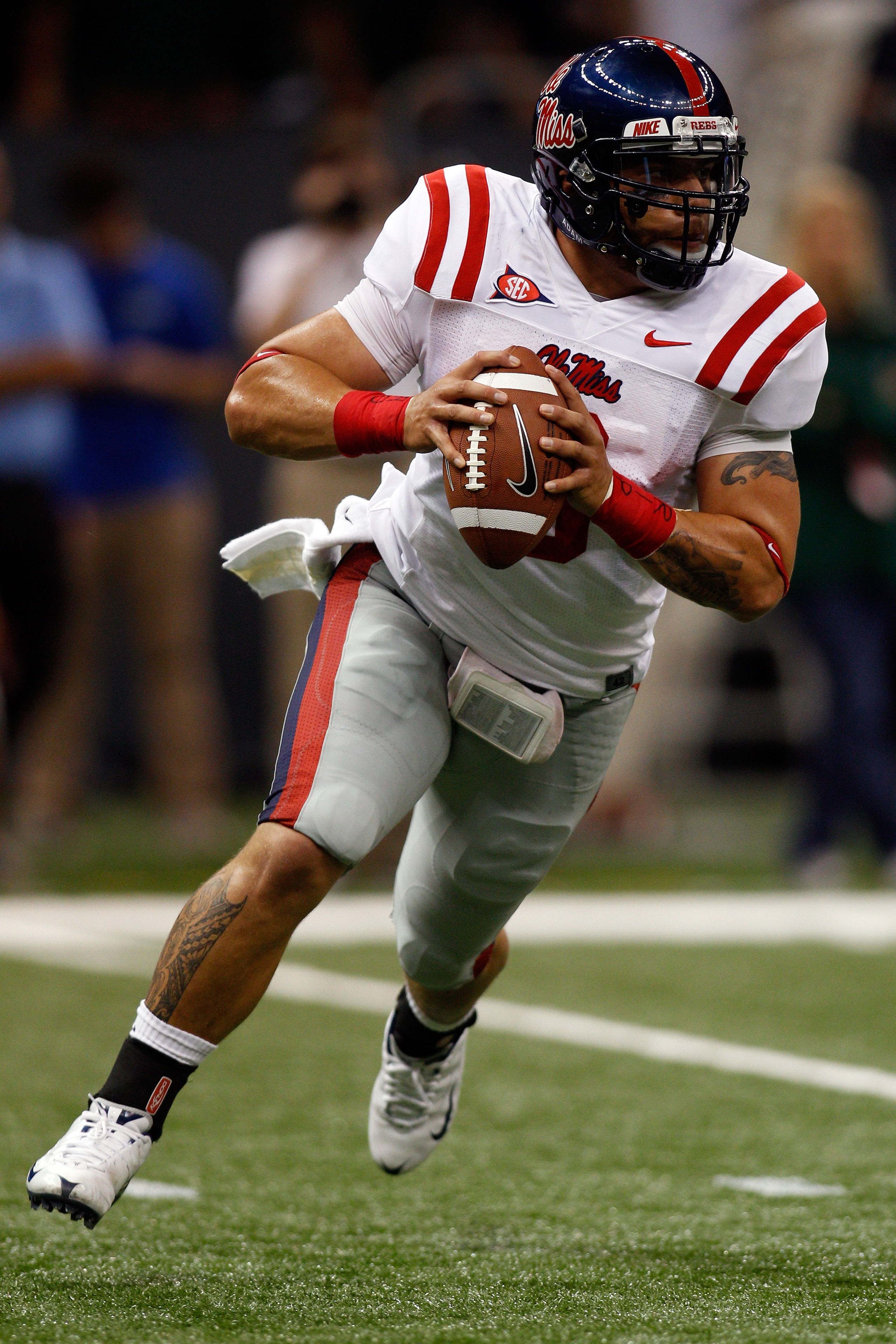 NEW ORLEANS - SEPTEMBER 11:  Jeremiah Masoli #8 of the Ole Miss Rebels looks to pass the ball against the the Tulane Green Wave at the Louisiana Superdome on September 11, 2010 in New Orleans, Louisiana.  Ole Miss defeated Tulane 27-13.  (Photo by Chris G