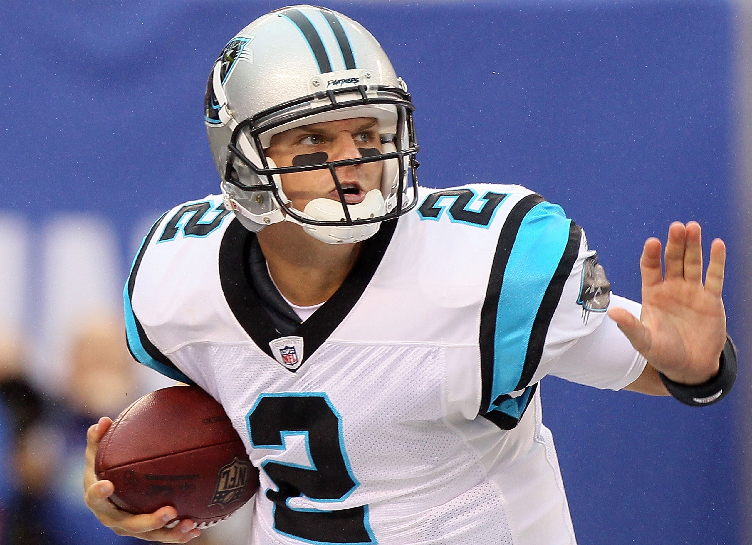 EAST RUTHERFORD, NJ - SEPTEMBER 12:  Jimmy Clausen #2 of the Carolina Panthers looks to make a pass against the New York Giants on September 12, 2010 at the New Meadowlands Stadium in East Rutherford, New Jersey. The Giants defeated the Panthers 31-18.  (